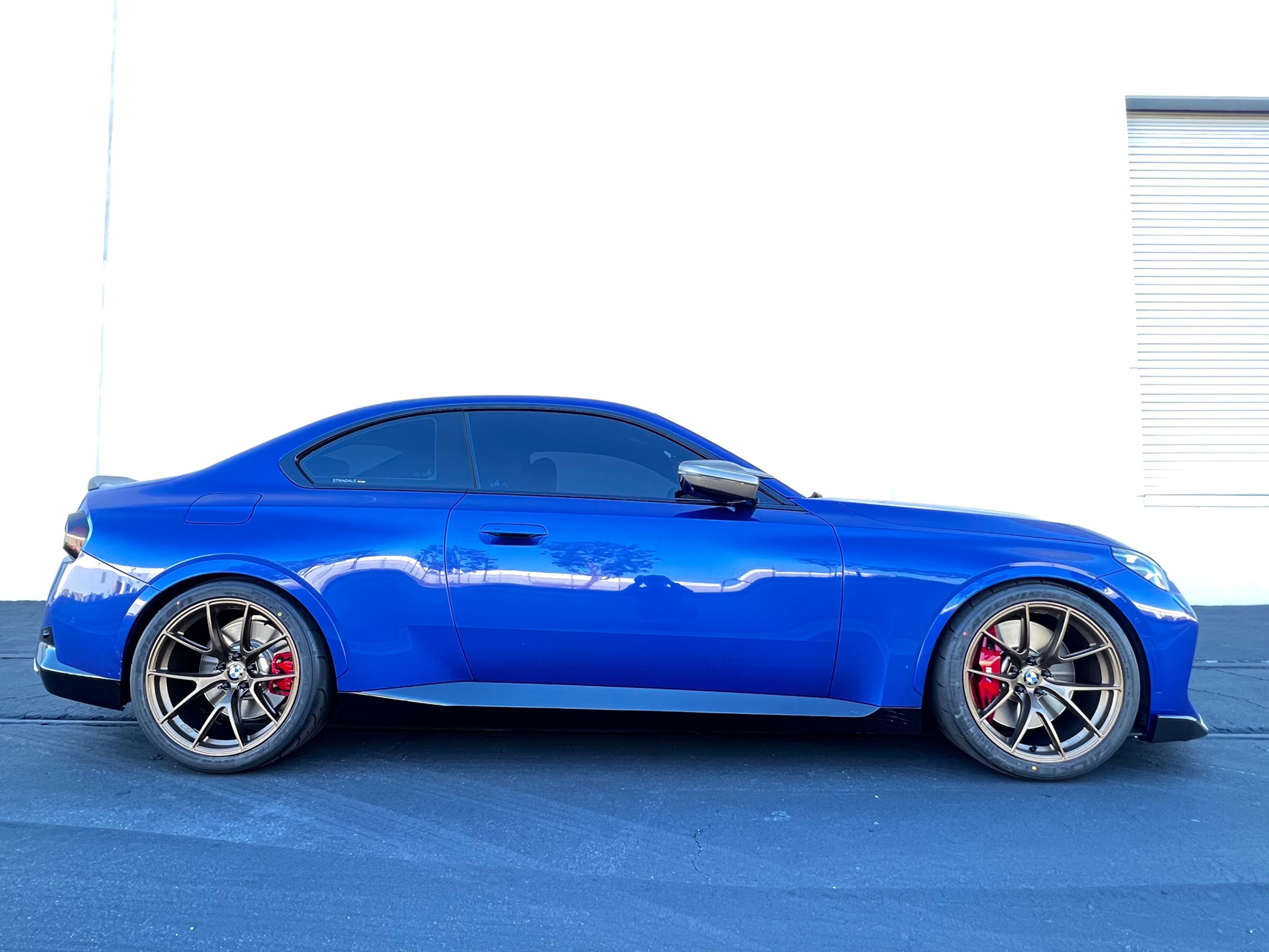 Blue BMW G42 2 Series with 19" VS-5RS Apex wheels in Satin Bronze