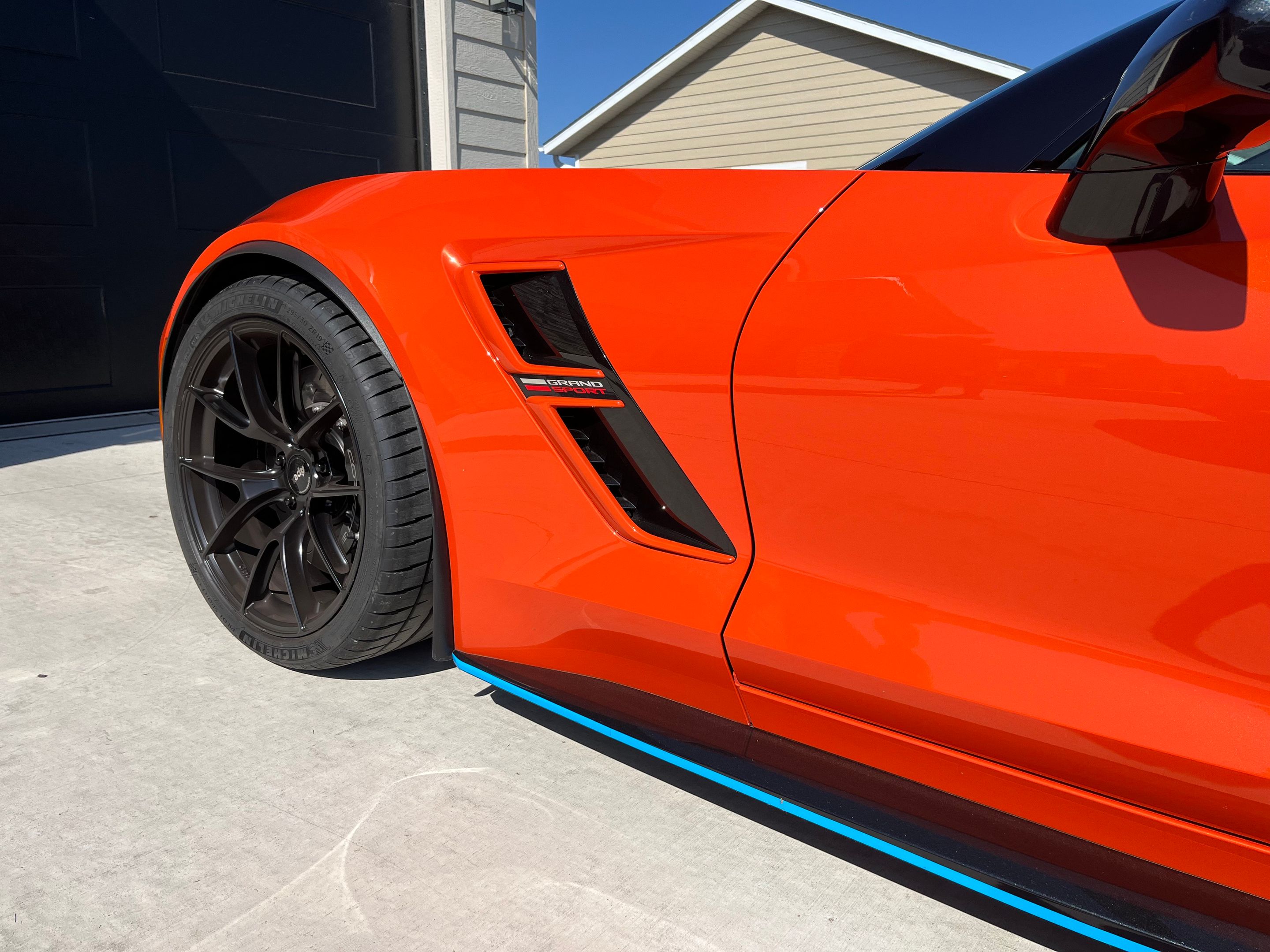 Orange Chevrolet C7 Corvette Grand Sport with 19" VS-5RS Apex wheels in Satin Black