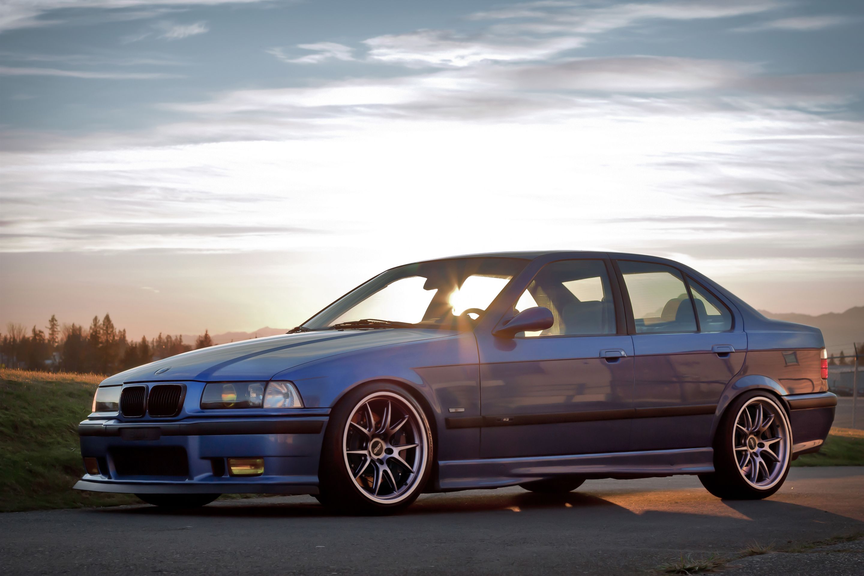 Blue BMW E36 M3 with 18" FL-5 Apex wheels in Race Silver