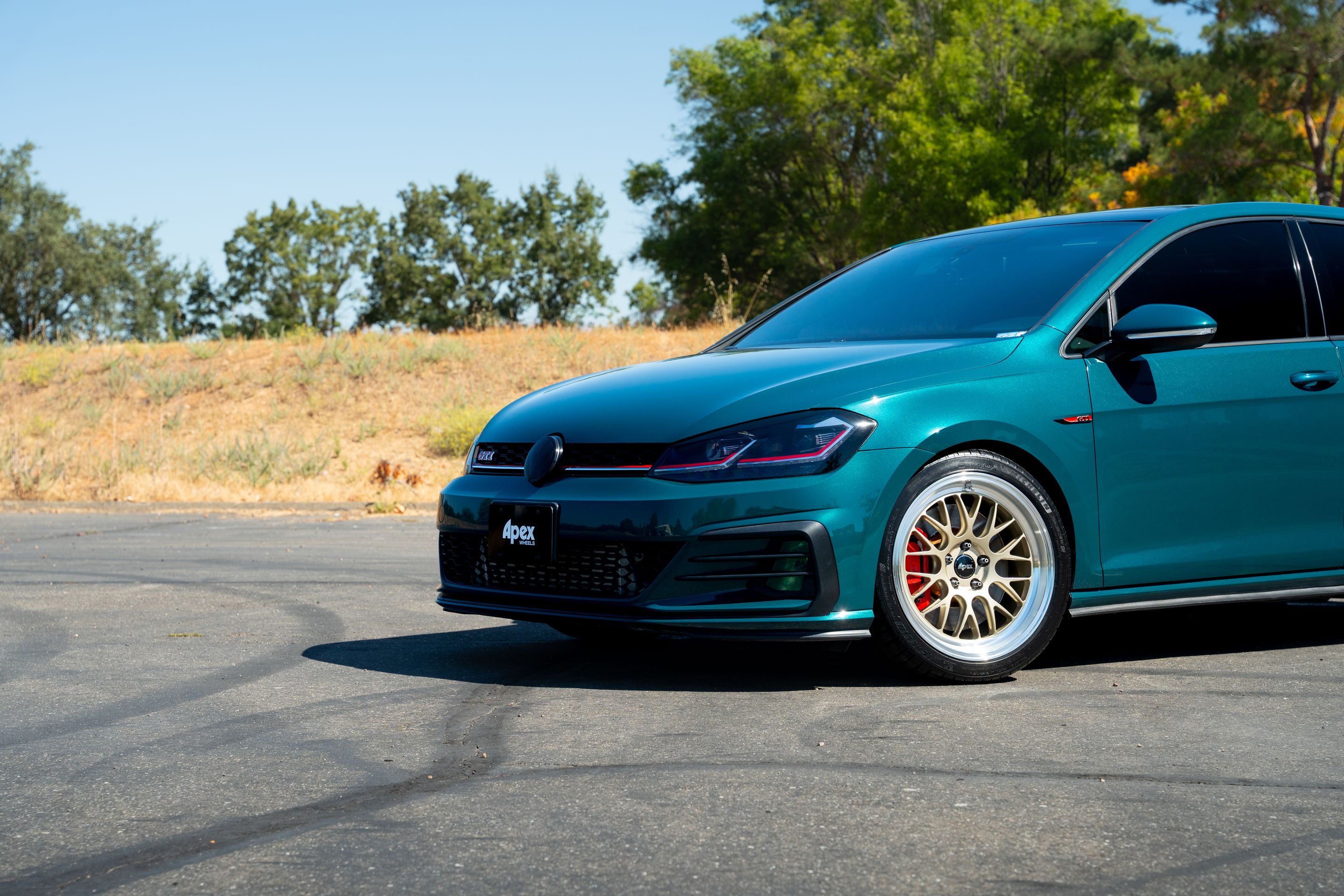 Green VW MK7 GTI with 18" ML-10RT Apex wheels in Machined Lip Gloss Motorsport Gold