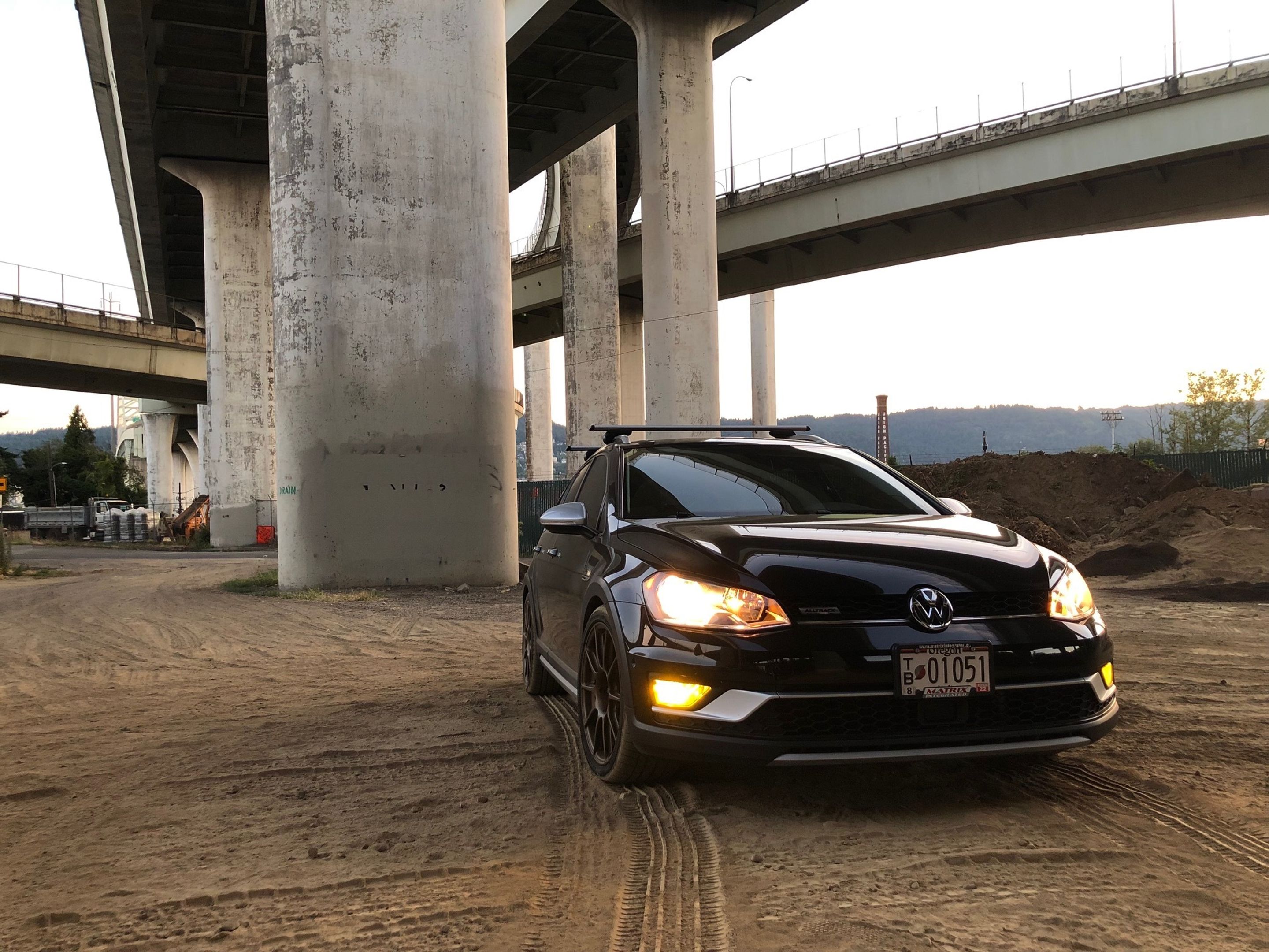 Black VW MK7 Alltrack/SportWagen Alltrack with 18" SM-10 Apex wheels in Satin Bronze