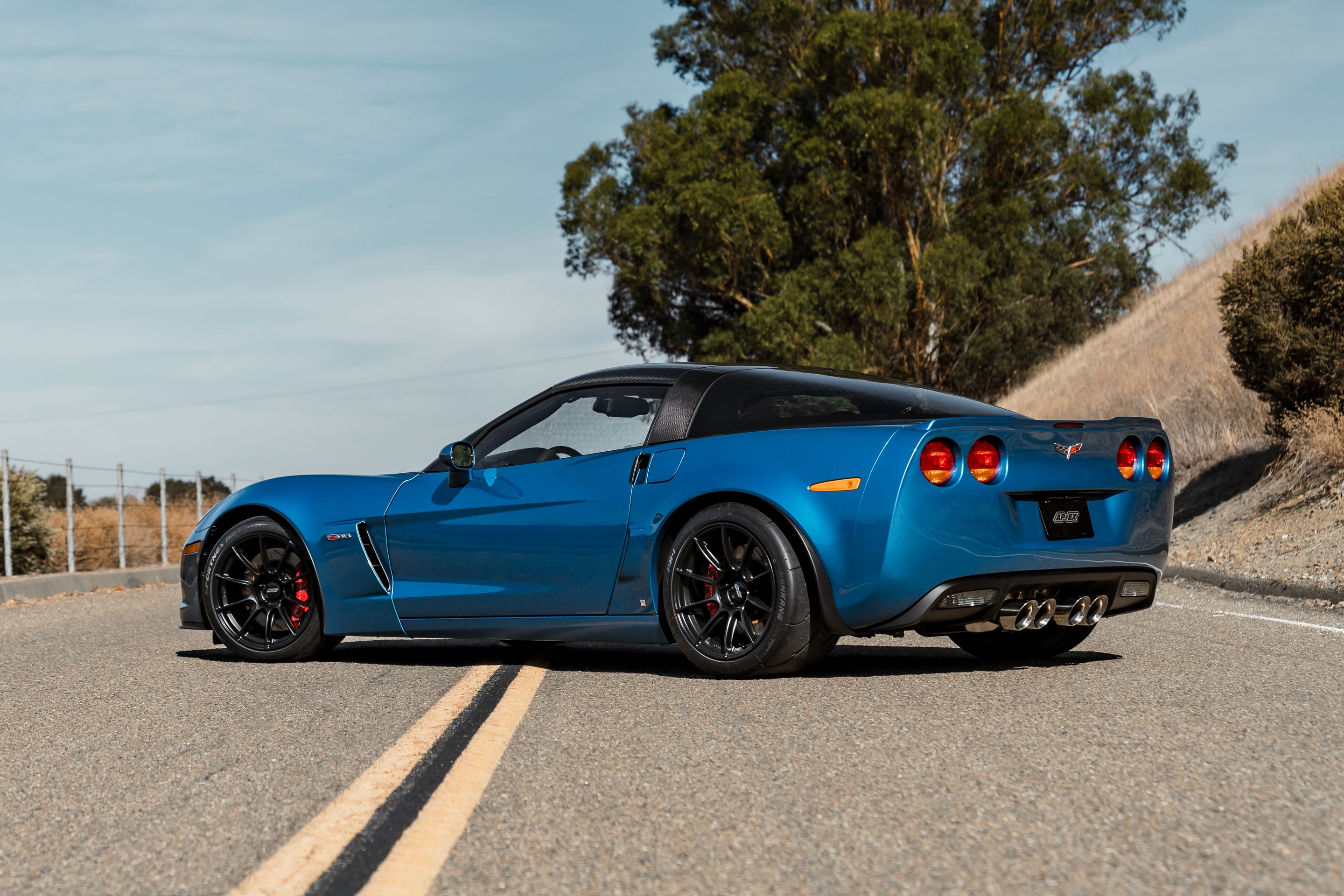 Blue Chevrolet C6 Corvette Z06 with 18" SM-10RS Apex wheels in Satin Black