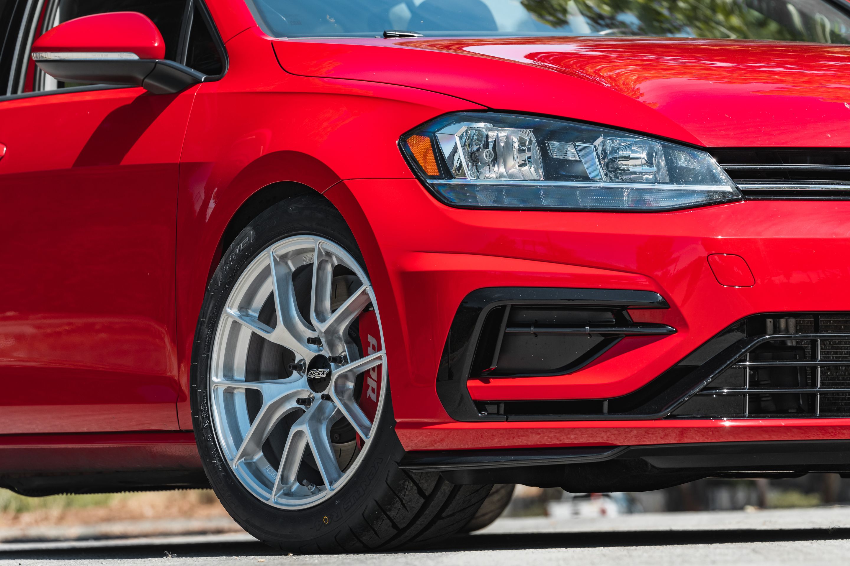 Red VW MK7 Alltrack/SportWagen Golf SportWagen with 17" VS-5RS Apex wheels in Brushed Clear