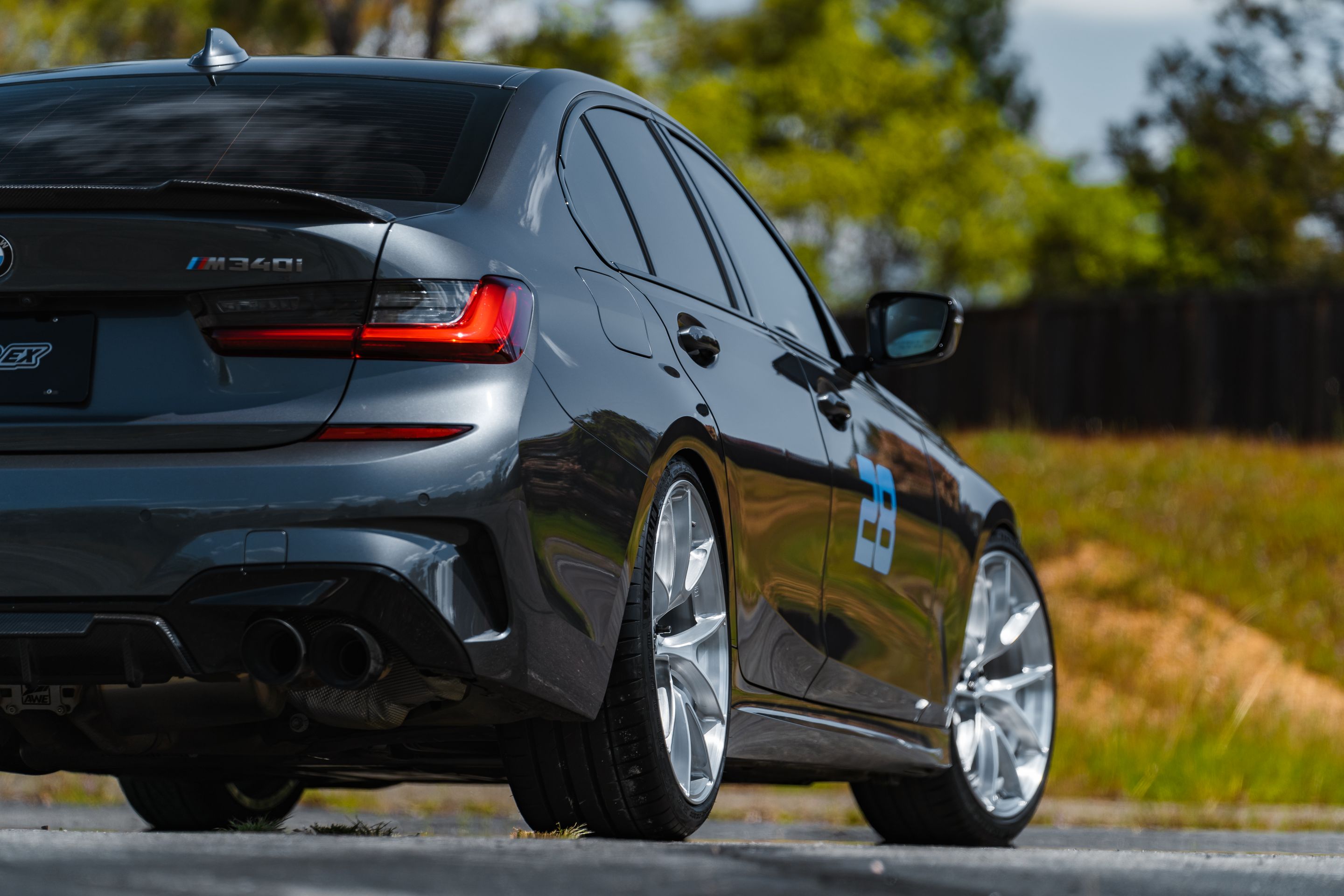 Grey BMW G20 Sedan 3 Series with 20" VS-5RS Apex wheels in Brushed Clear