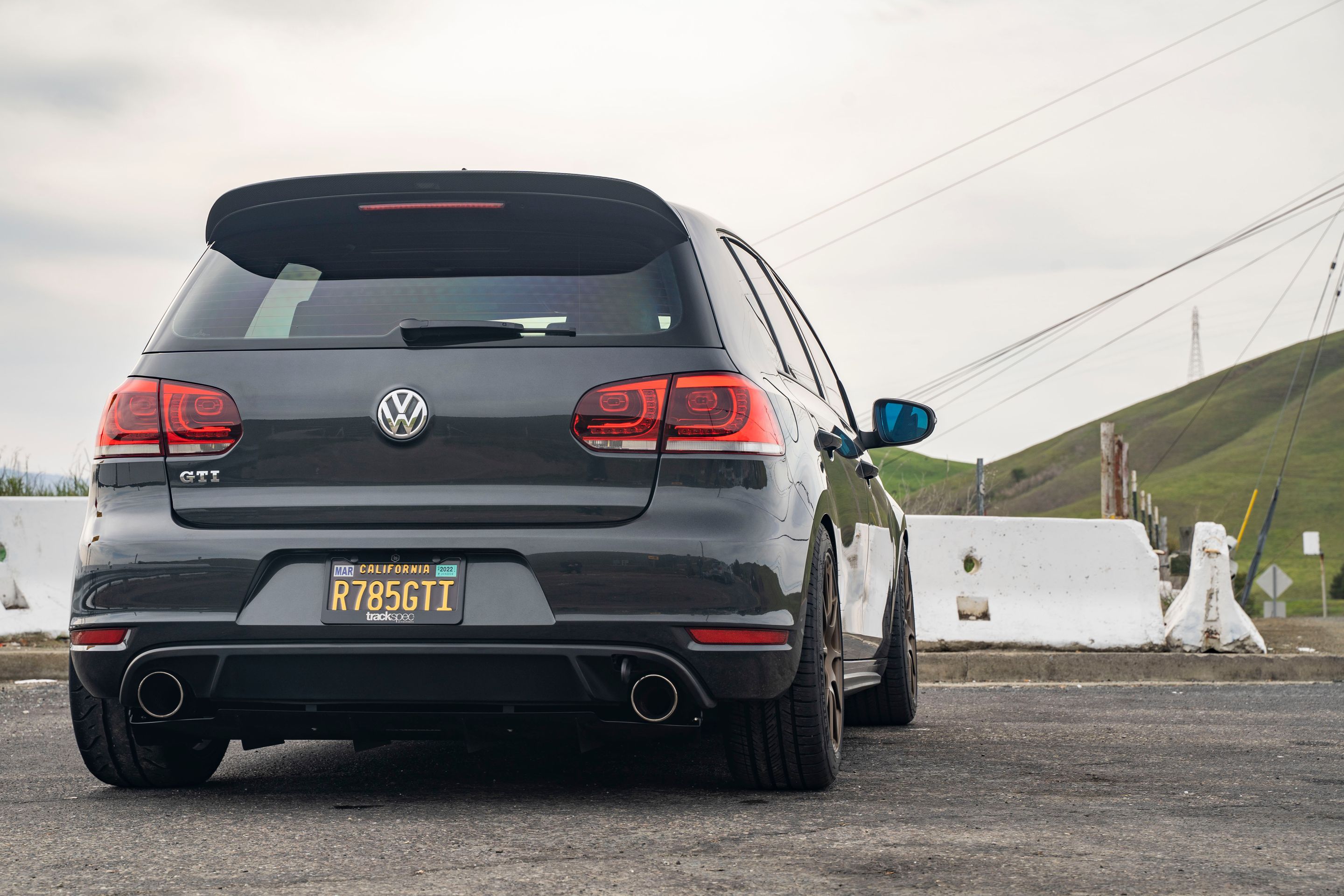 Grey VW MK6 GTI with 17" SM-10 Apex wheels in Satin Bronze