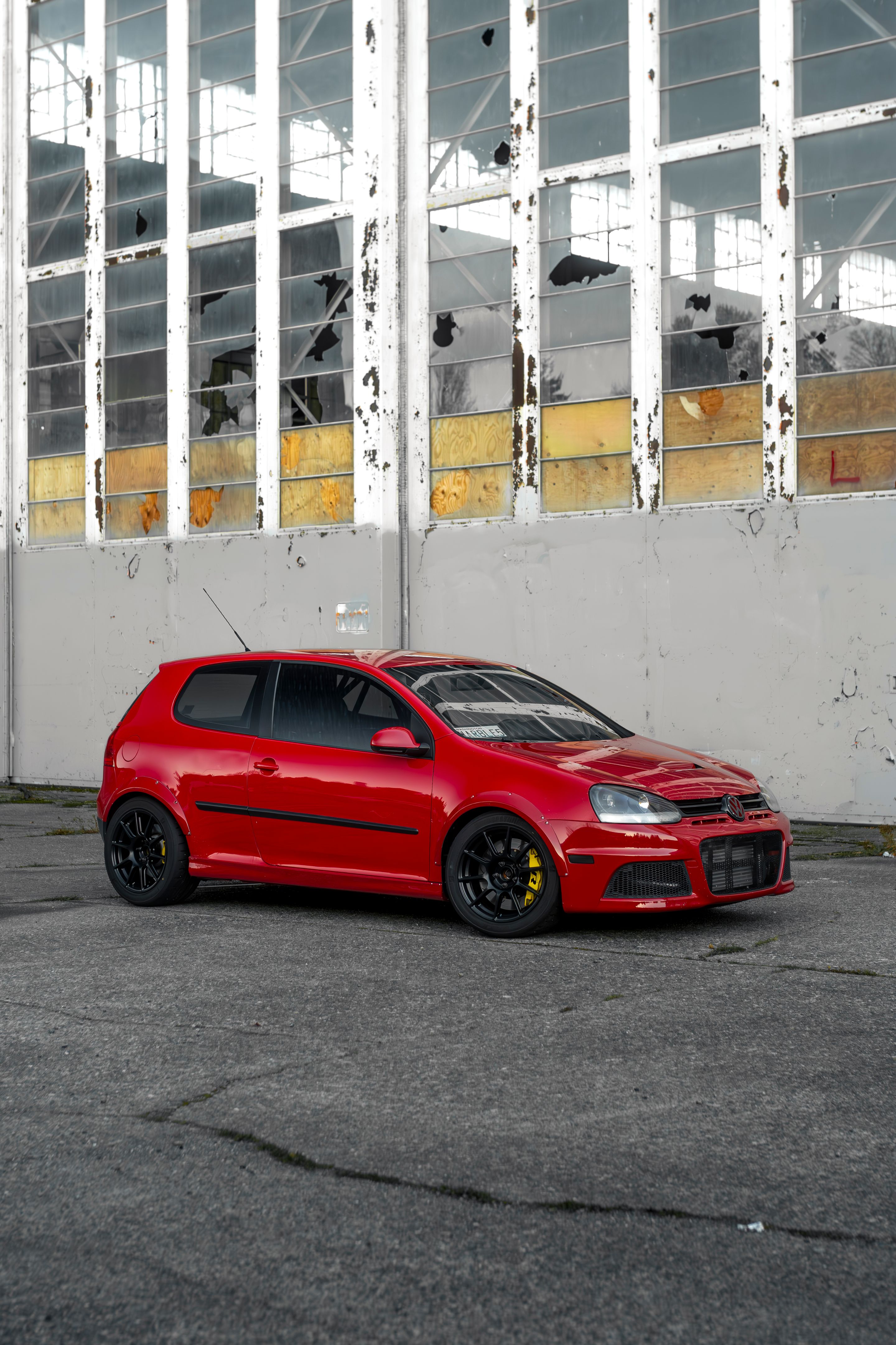 Red VW MK5 Golf with 17" SM-10 Apex wheels in Satin Black