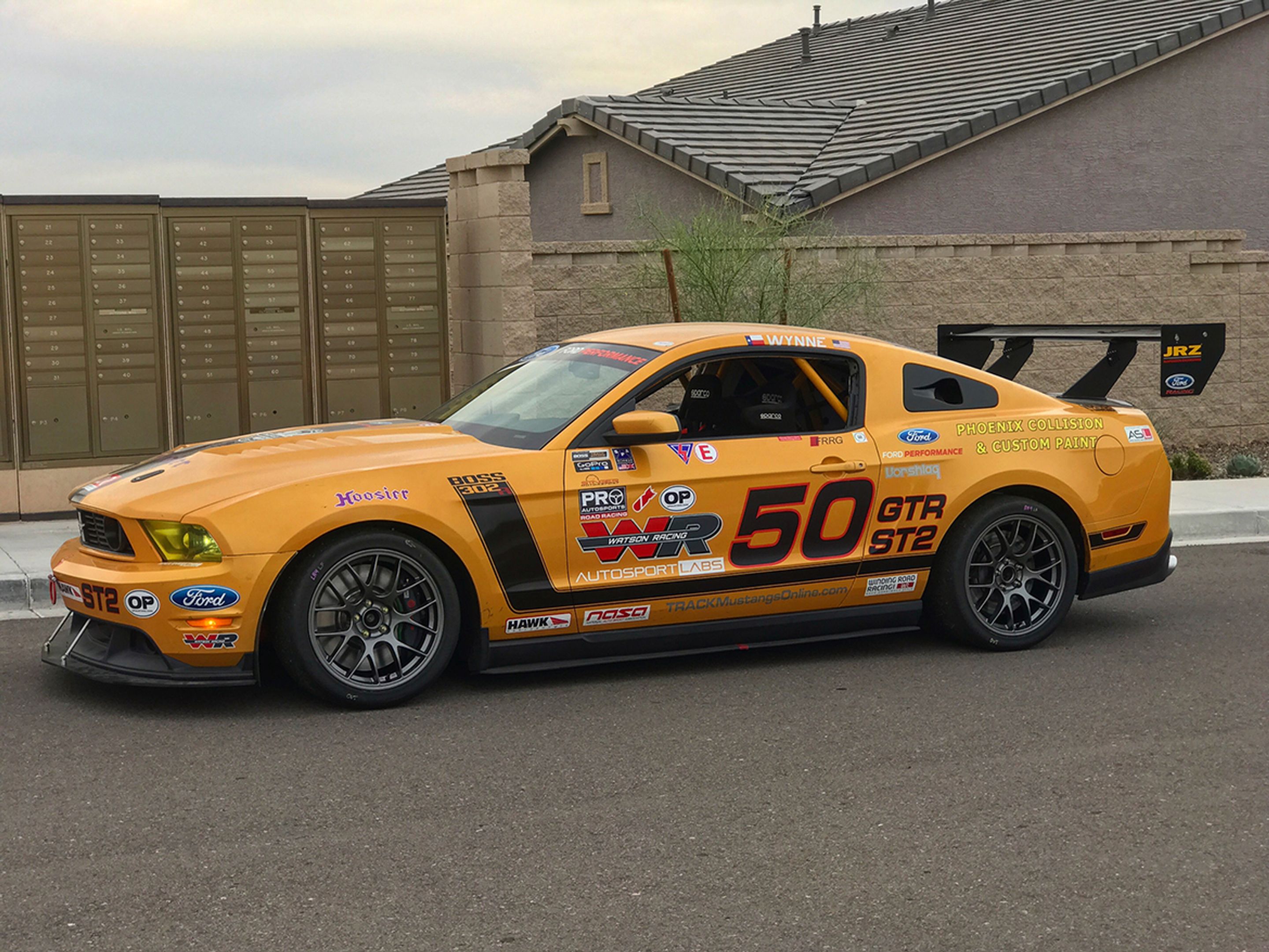 Yellow Ford S197 Mustang GT with 18" EC-7 Apex wheels in Anthracite