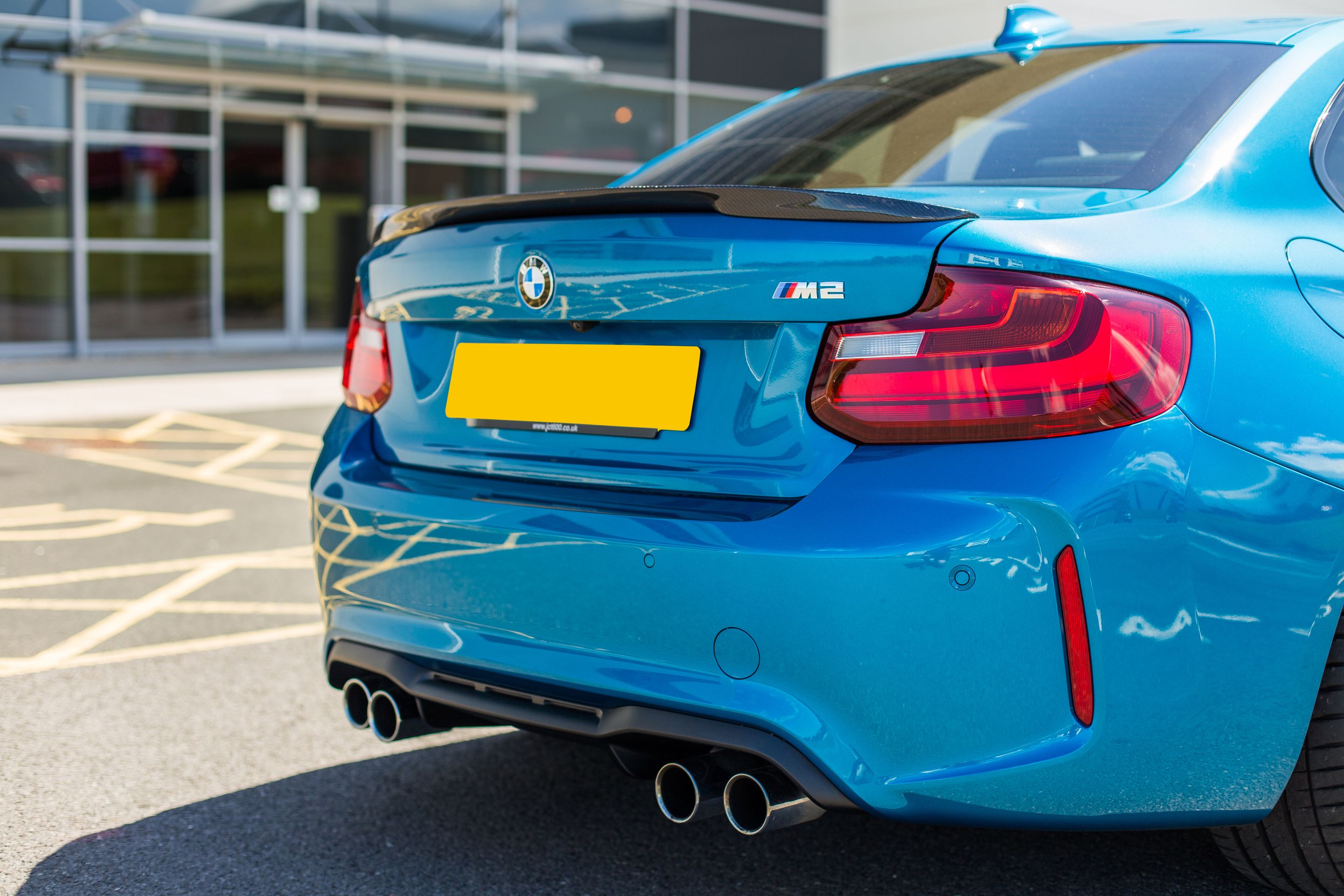 Blue BMW F87 M2 with 18" EC-7 Apex wheels in Anthracite