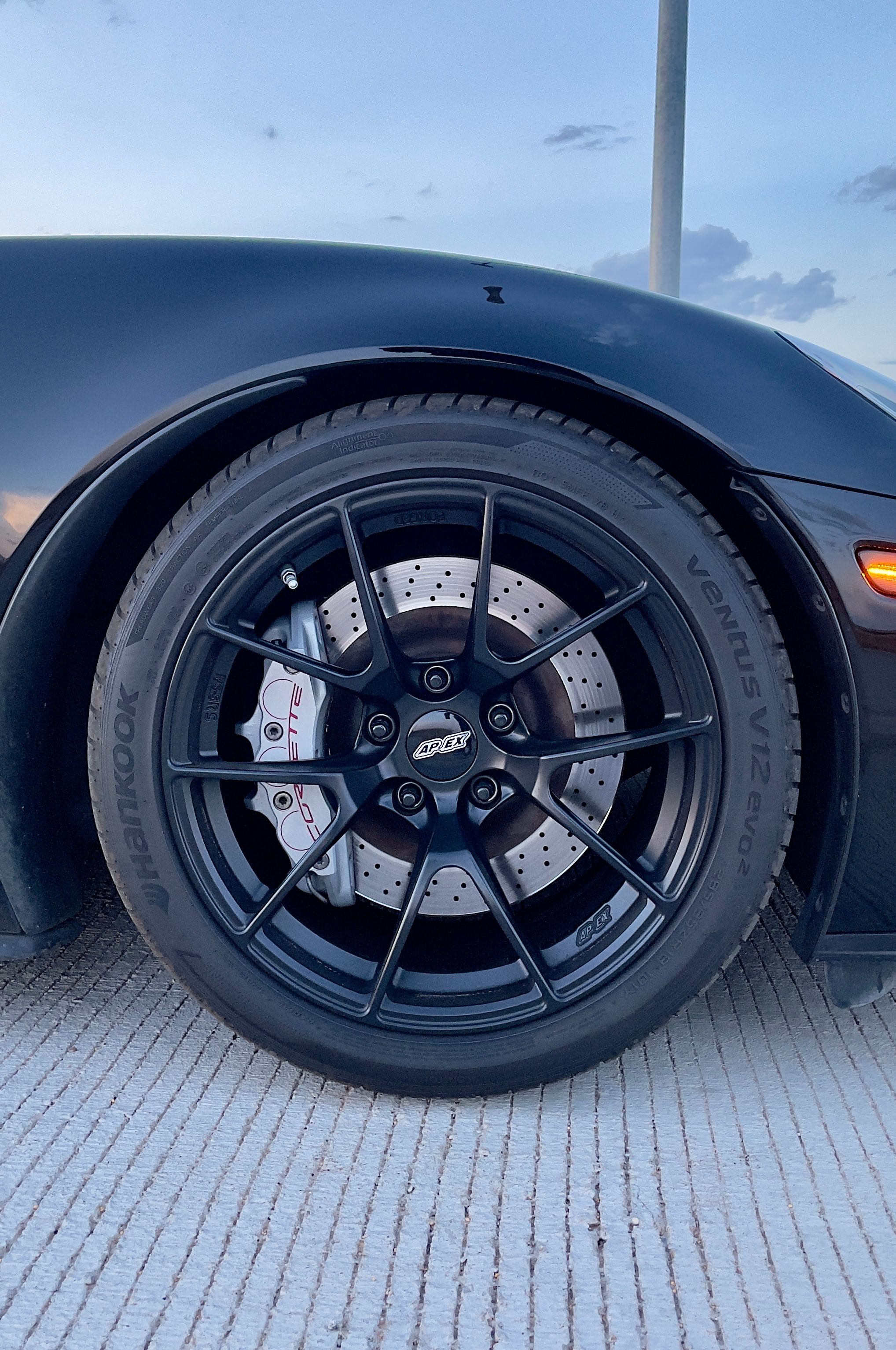 Black Chevrolet C6 Corvette Grand Sport with 18"/19" VS-5RS Apex wheels in Satin Black