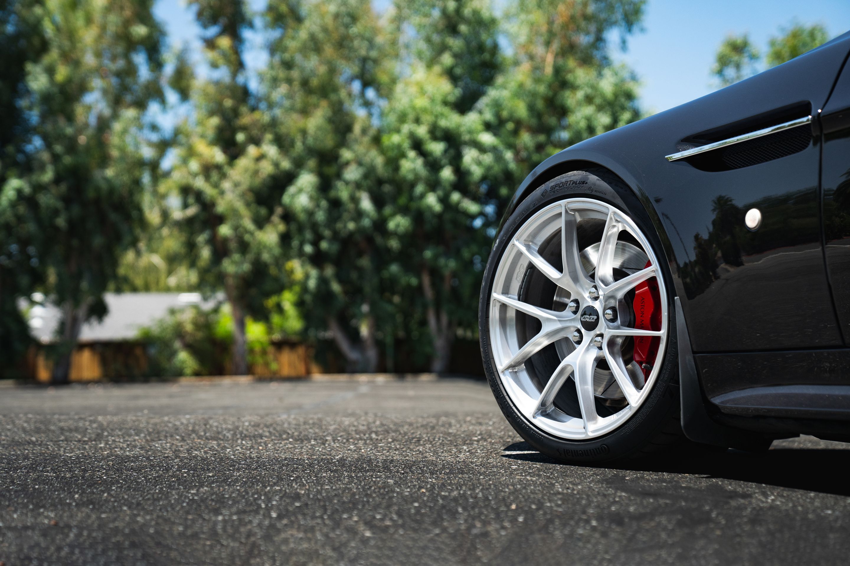 Black Aston Martin V8/V12 Vantage with 19" VS-5RS Apex wheels in Brushed Clear