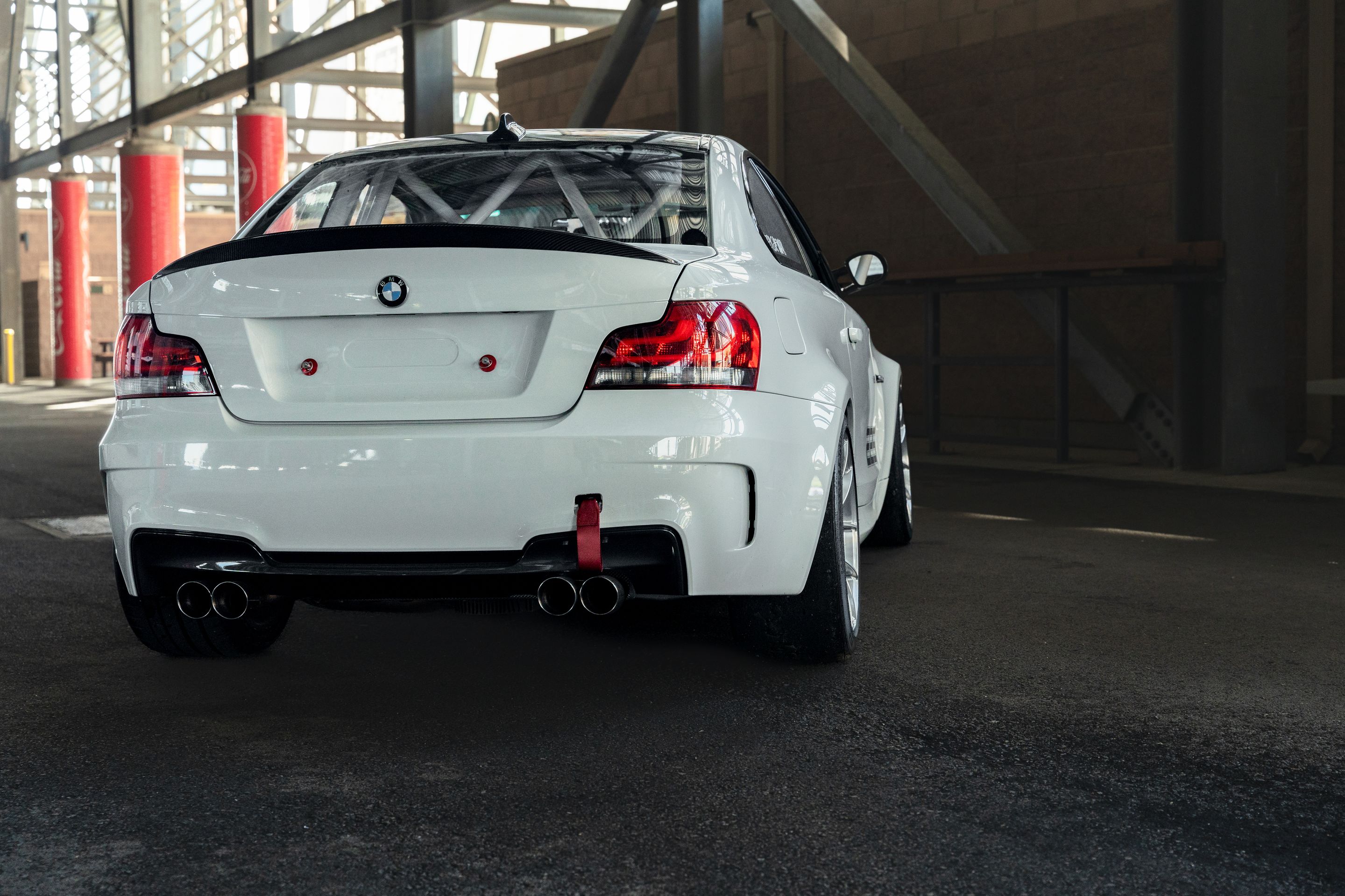 White BMW E82 1M with 18" VS-5RS Apex wheels in Brushed Clear