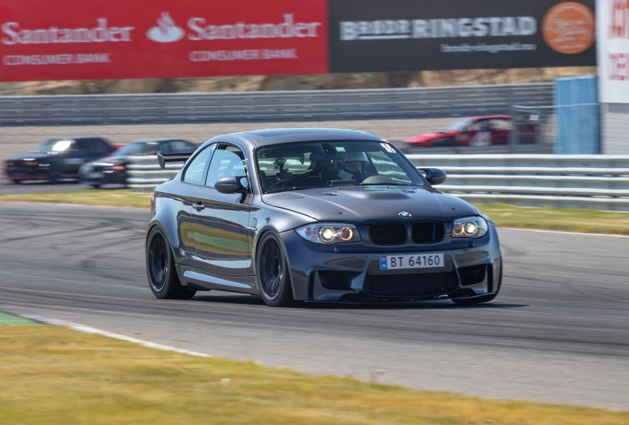 Grey BMW E82 1M with 18" SM-10 Apex wheels in Satin Black