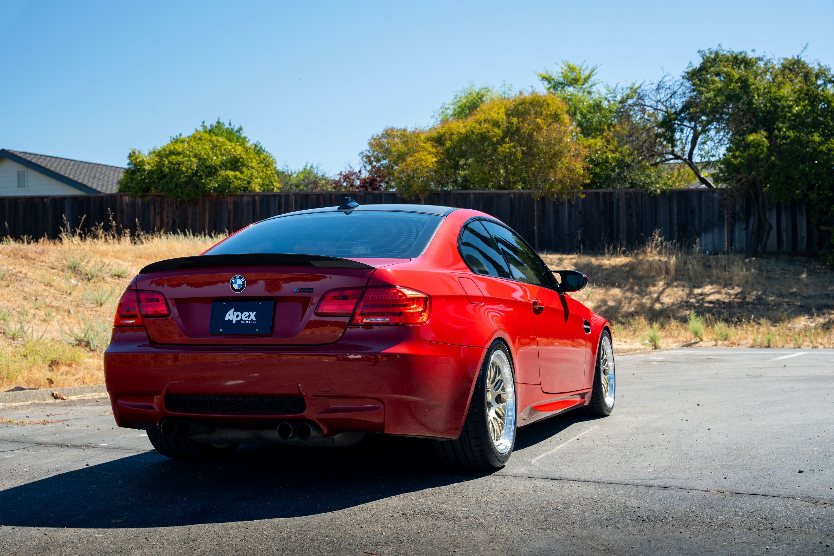 Red BMW E92 Coupe M3 with 18" ML-10RT Apex wheels in Machined Lip Gloss Motorsport Gold