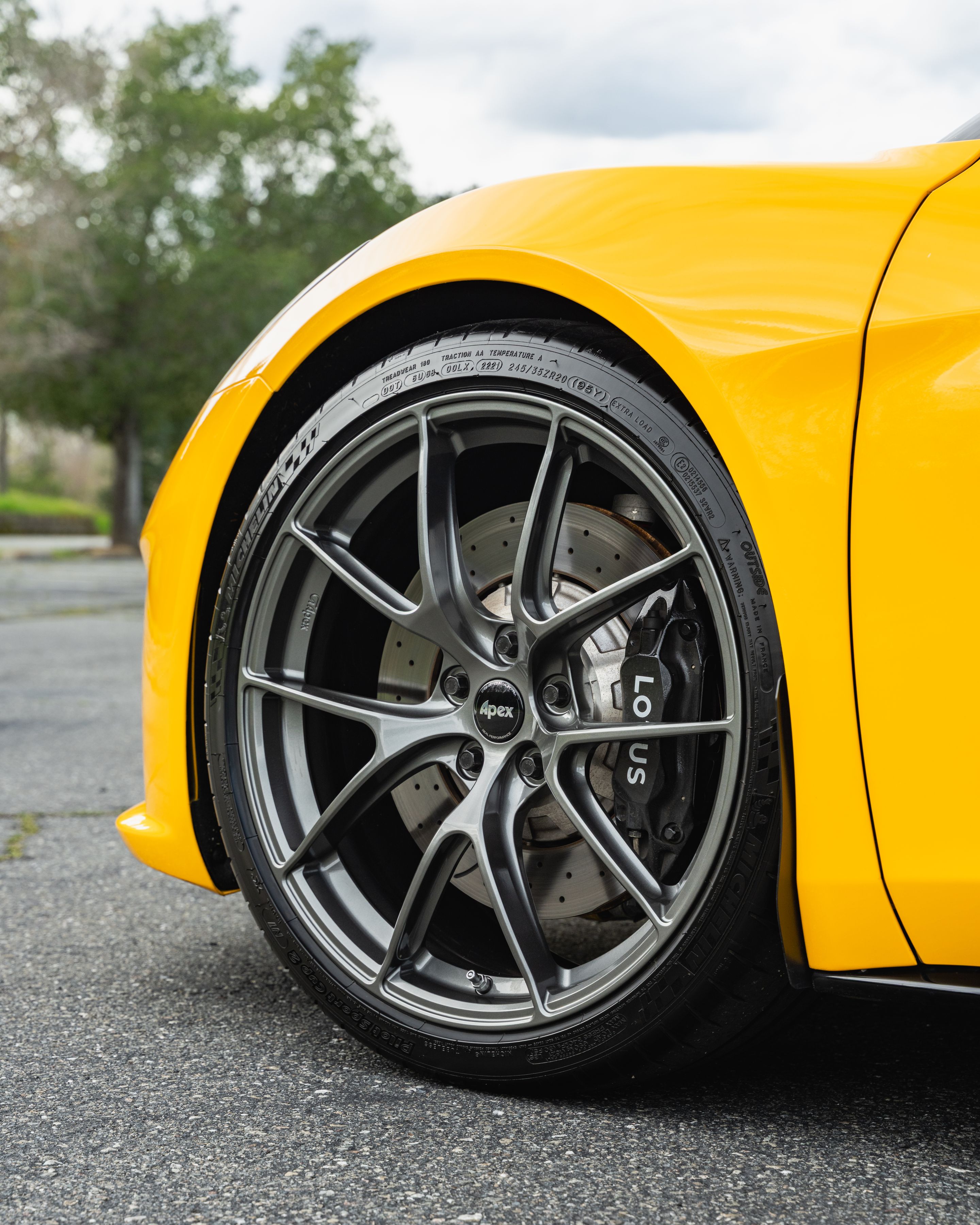 Yellow Lotus Emira with 20" VS-5RS Apex wheels in Anthracite
