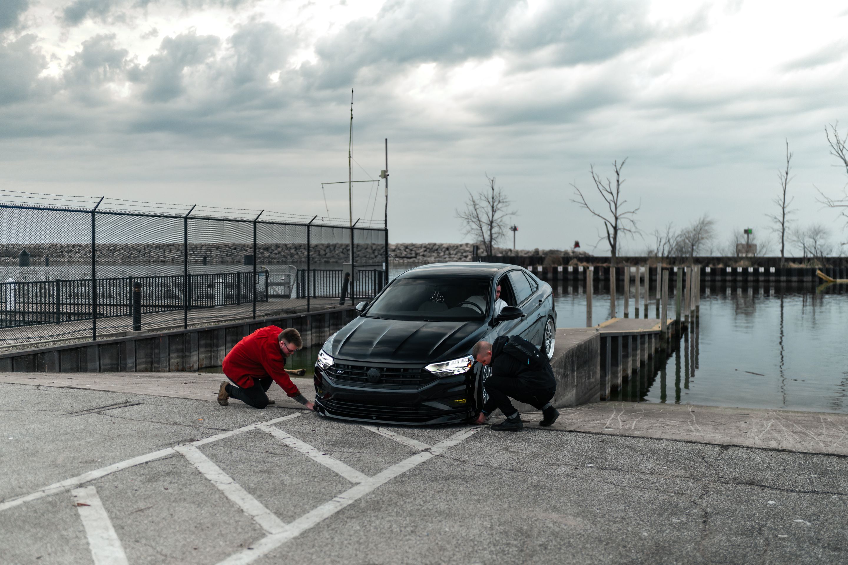 Black VW MK7 Jetta with 19" ML-10RT Apex wheels in Machined Lip Race Silver