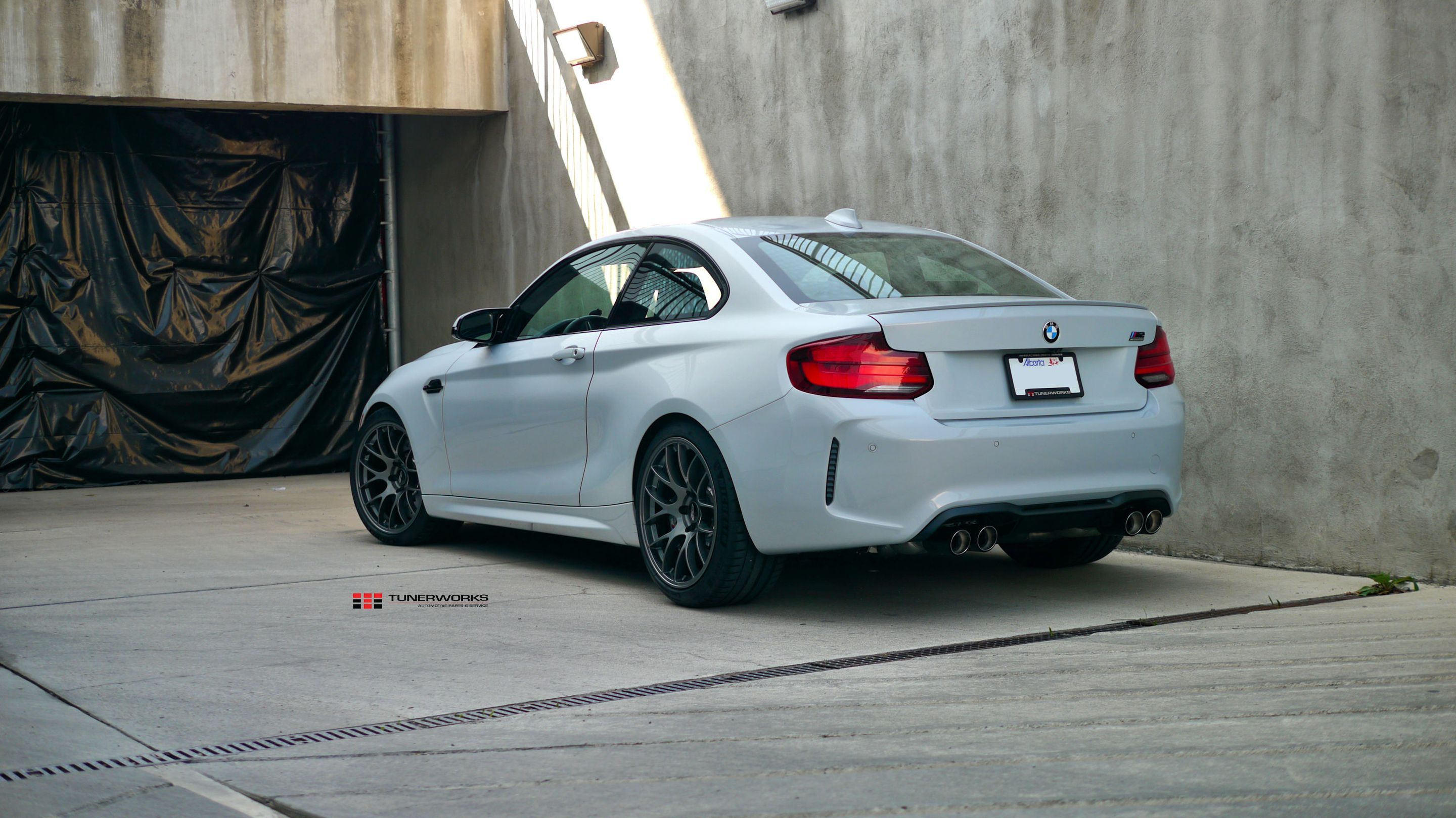 Silver BMW F87 M2 with 19" EC-7 Apex wheels in Anthracite
