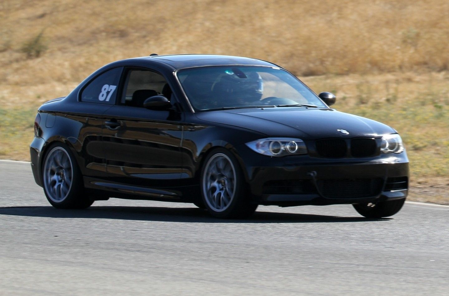 Black BMW E82 Coupe 1 Series with 18" EC-7 Apex wheels in Race Silver