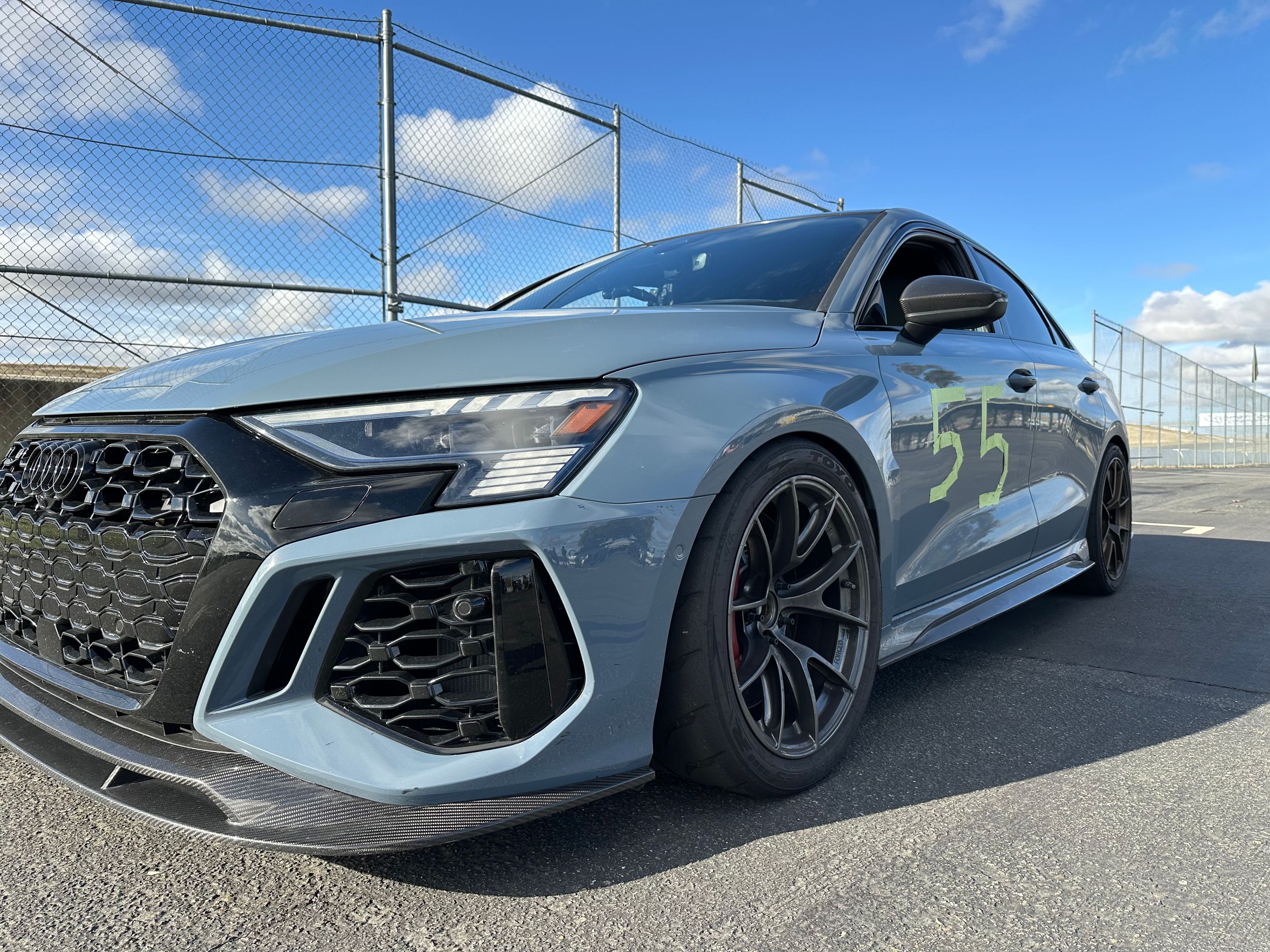 Blue Audi 8Y RS 3 with 18" VS-5RS Apex wheels in Anthracite