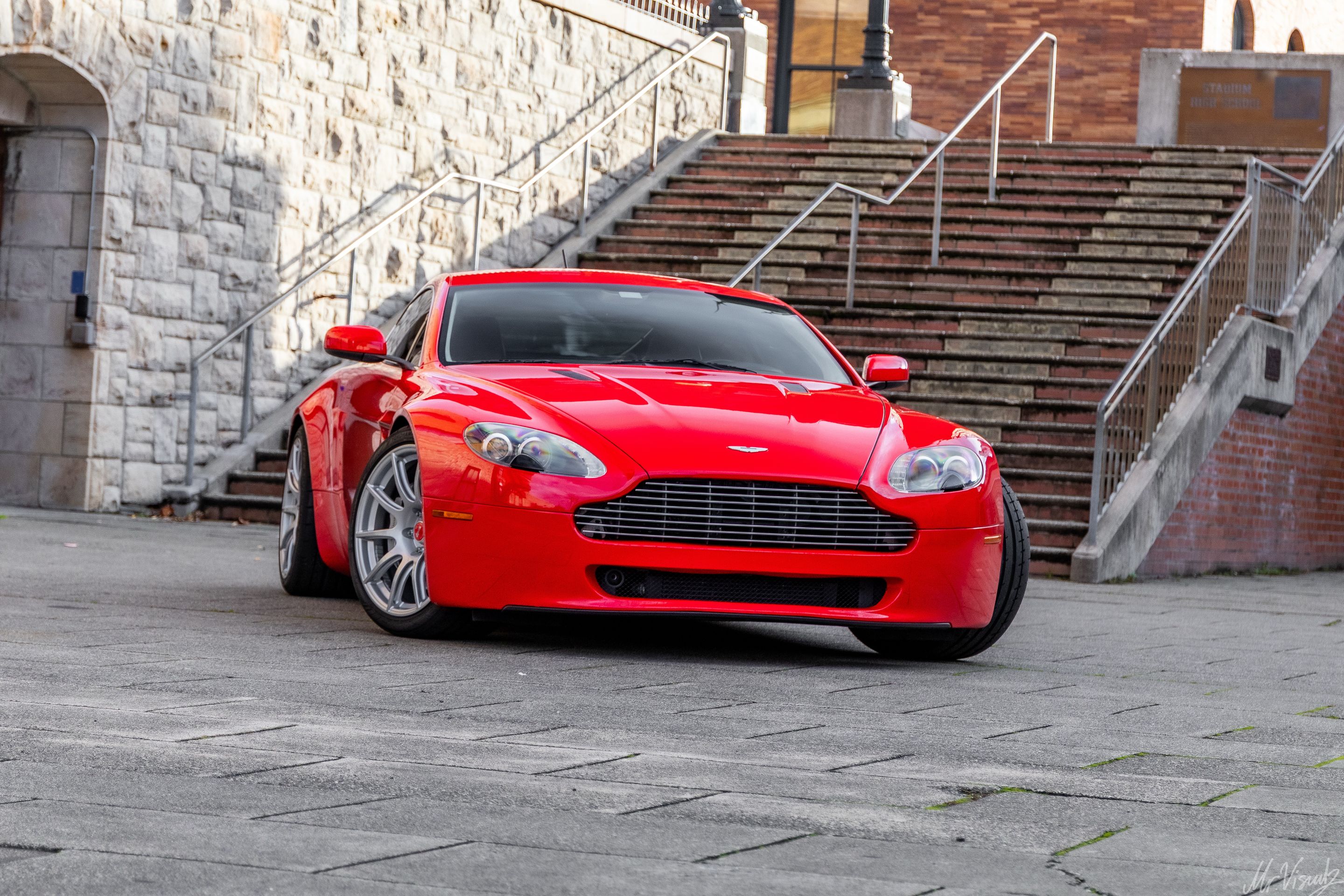 Red Aston Martin V8/V12 Vantage with 19" SM-10 Apex wheels in Race Silver
