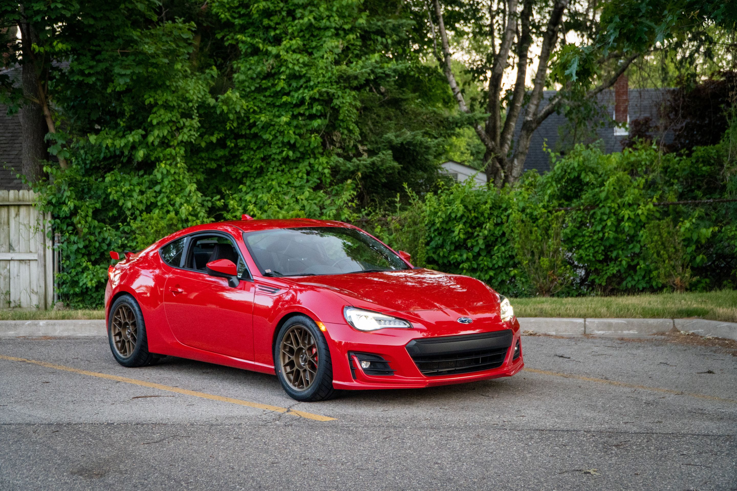 Red Subaru ZC6 / Gen 1 BRZ with 17" ARC-8 Apex wheels in Satin Bronze