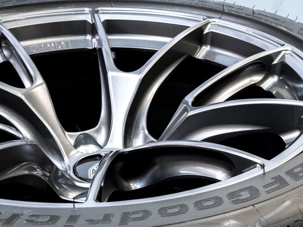 Angled photo of Anthracite APEX VS-5RS wheel showing side-milled spokes