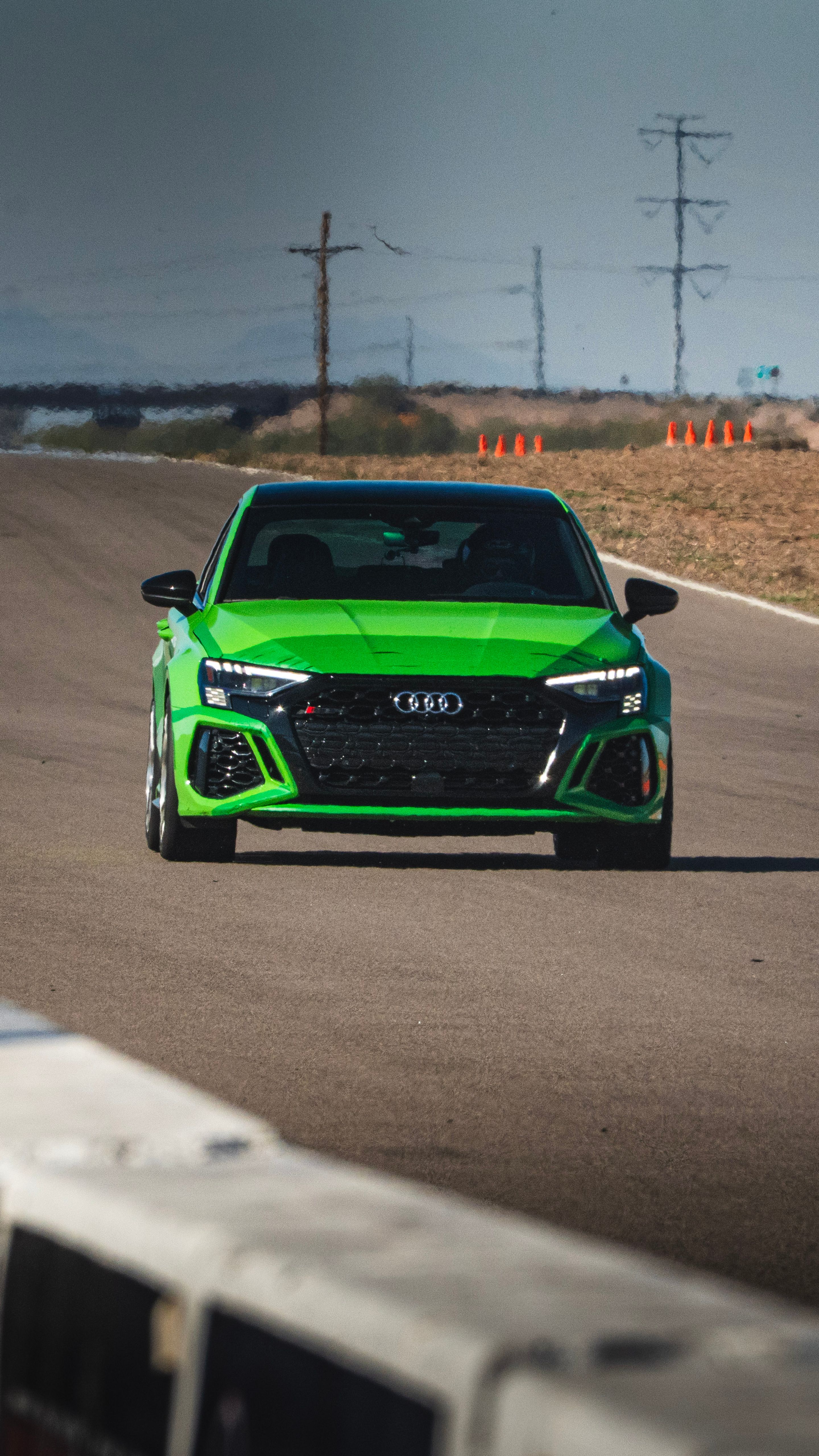 Green Audi 8Y RS 3 with 18" VS-5RS Apex wheels in Brushed Clear
