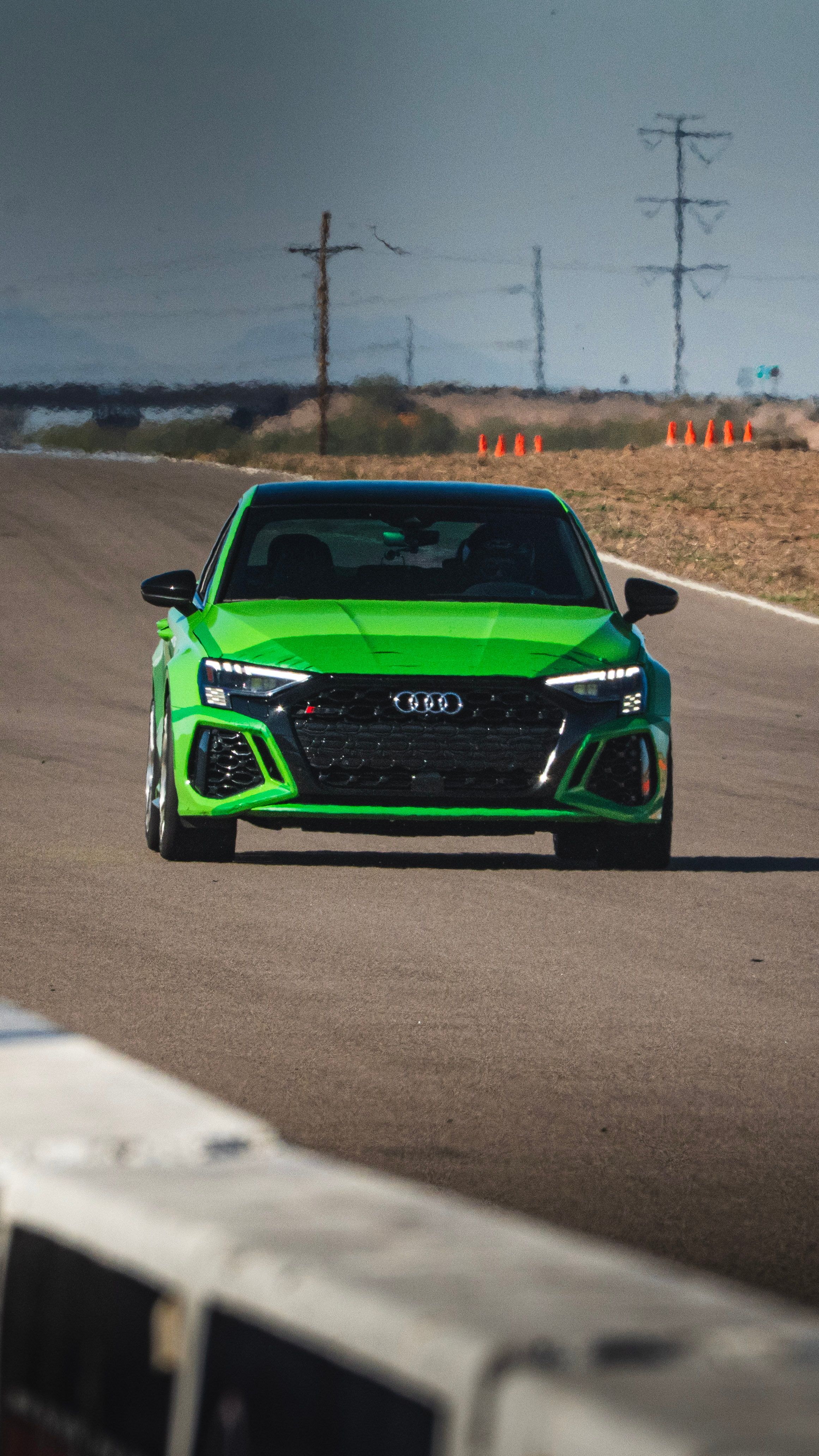 Green Audi 8Y RS 3 with 18" VS-5RS Apex wheels in Brushed Clear