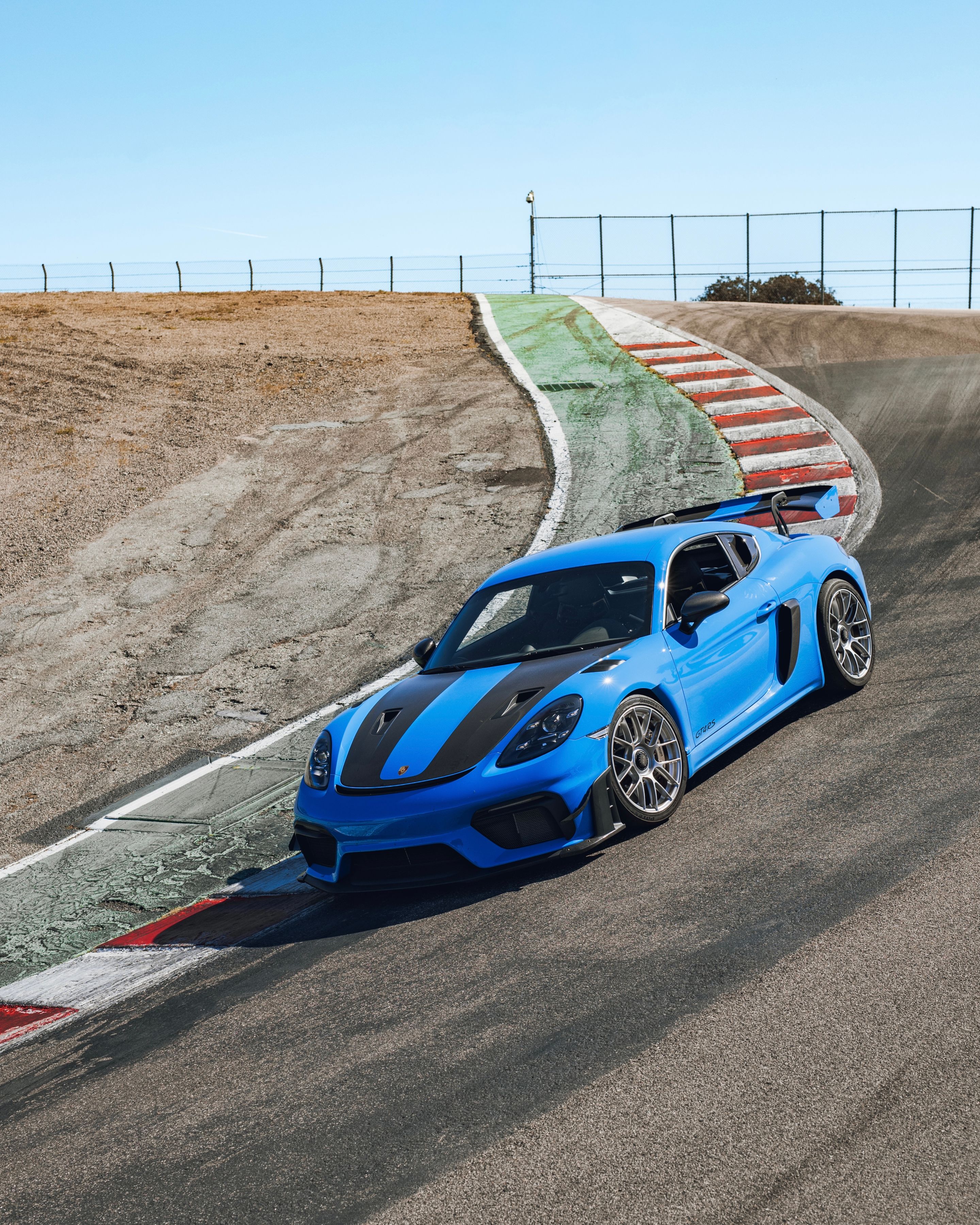 Blue Porsche 718 Cayman GT4 RS with 19" EC-7RS Apex wheels in Race Silver