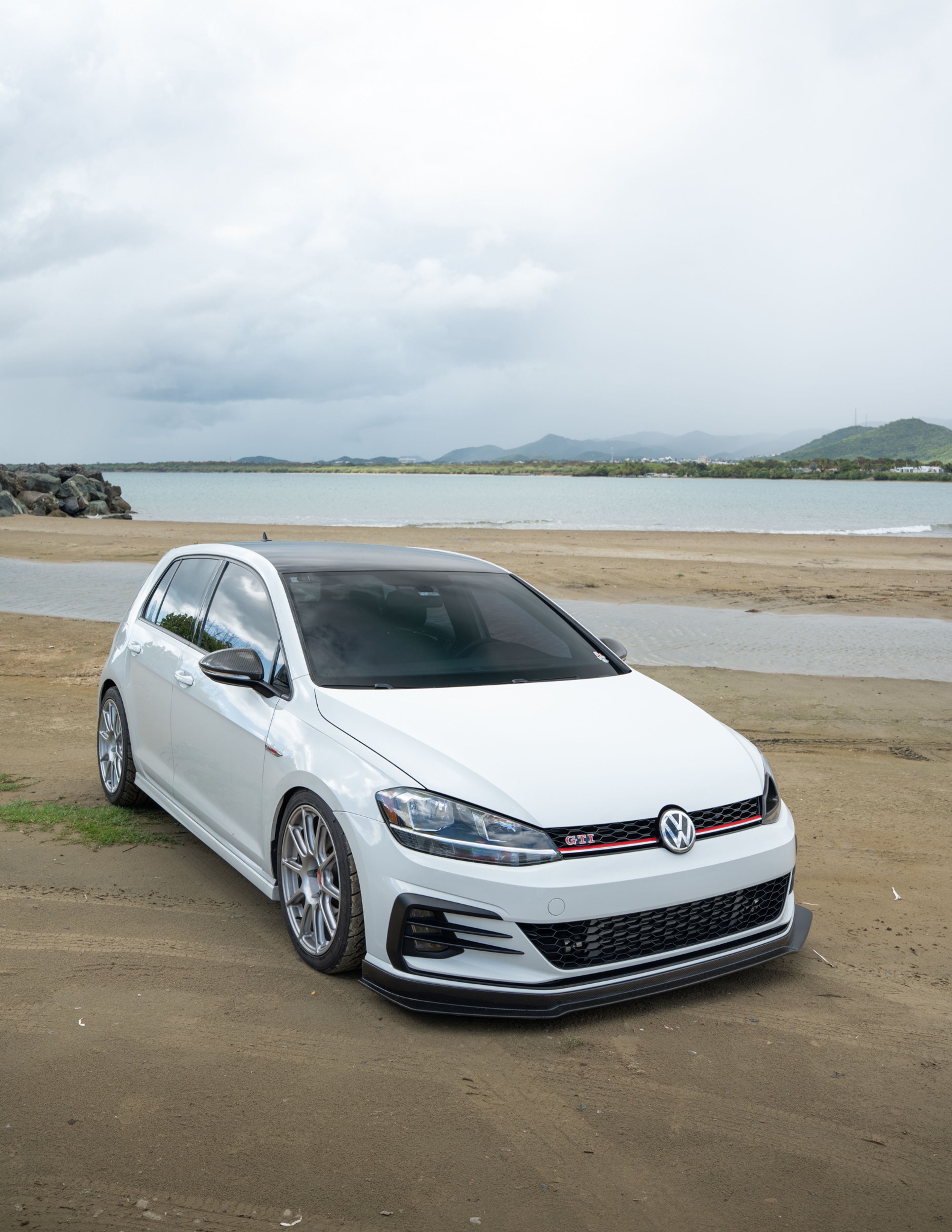 White VW MK7 GTI with 18" SM-10 Apex wheels in Race Silver
