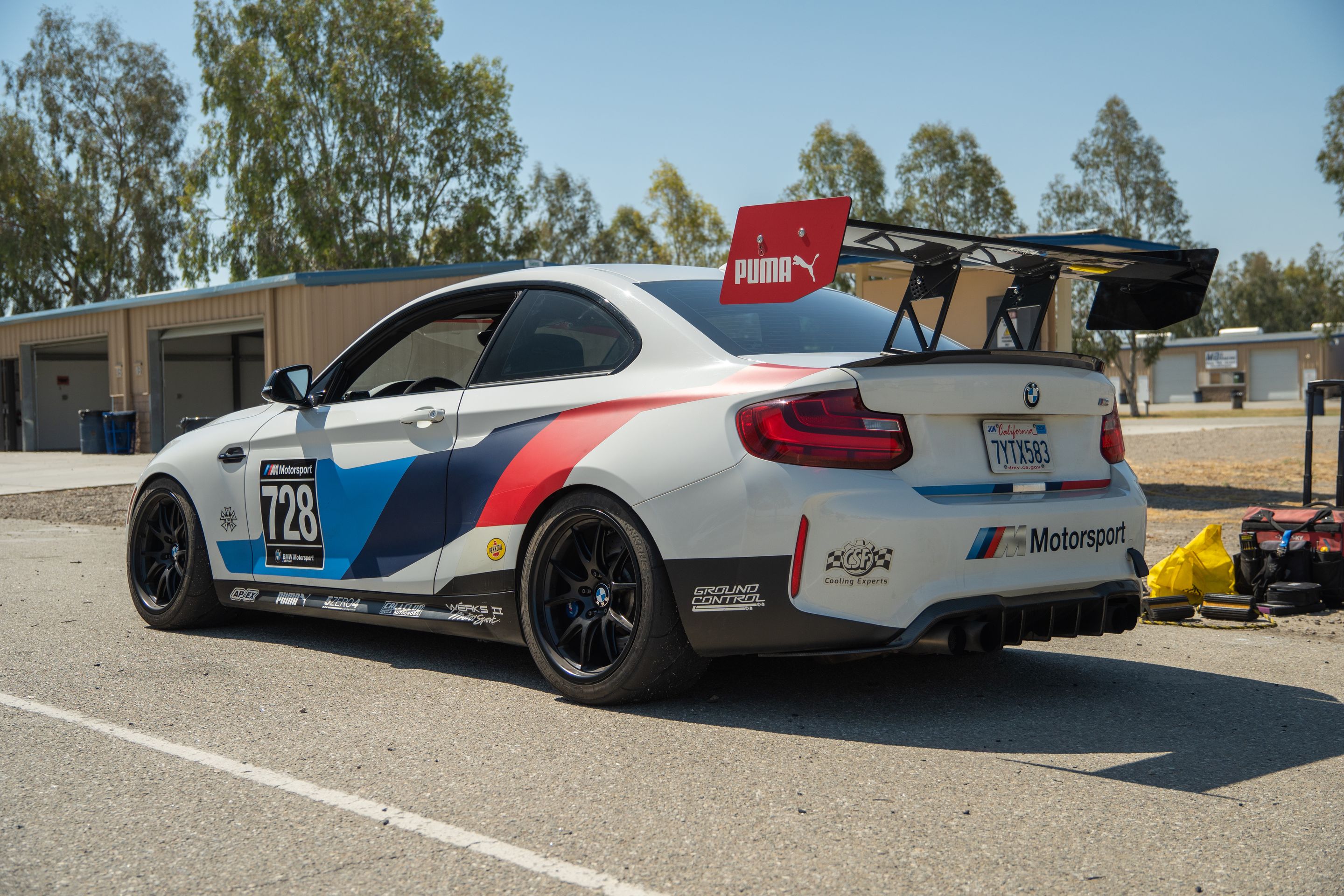 White BMW F87 M2 with 18" FL-5 Apex wheels in Satin Black