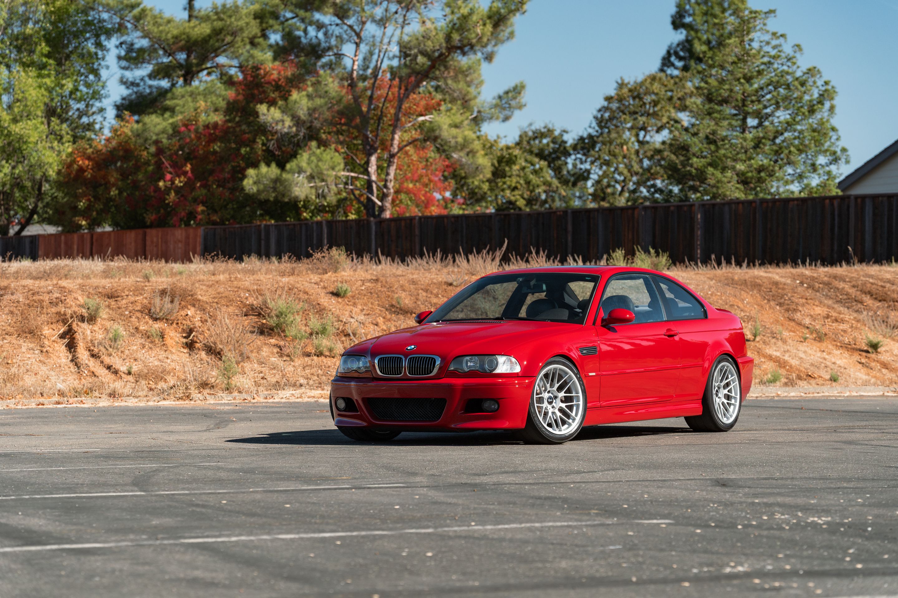 Red BMW E46 M3 with 18" ARC-8RT Apex wheels in Race Silver