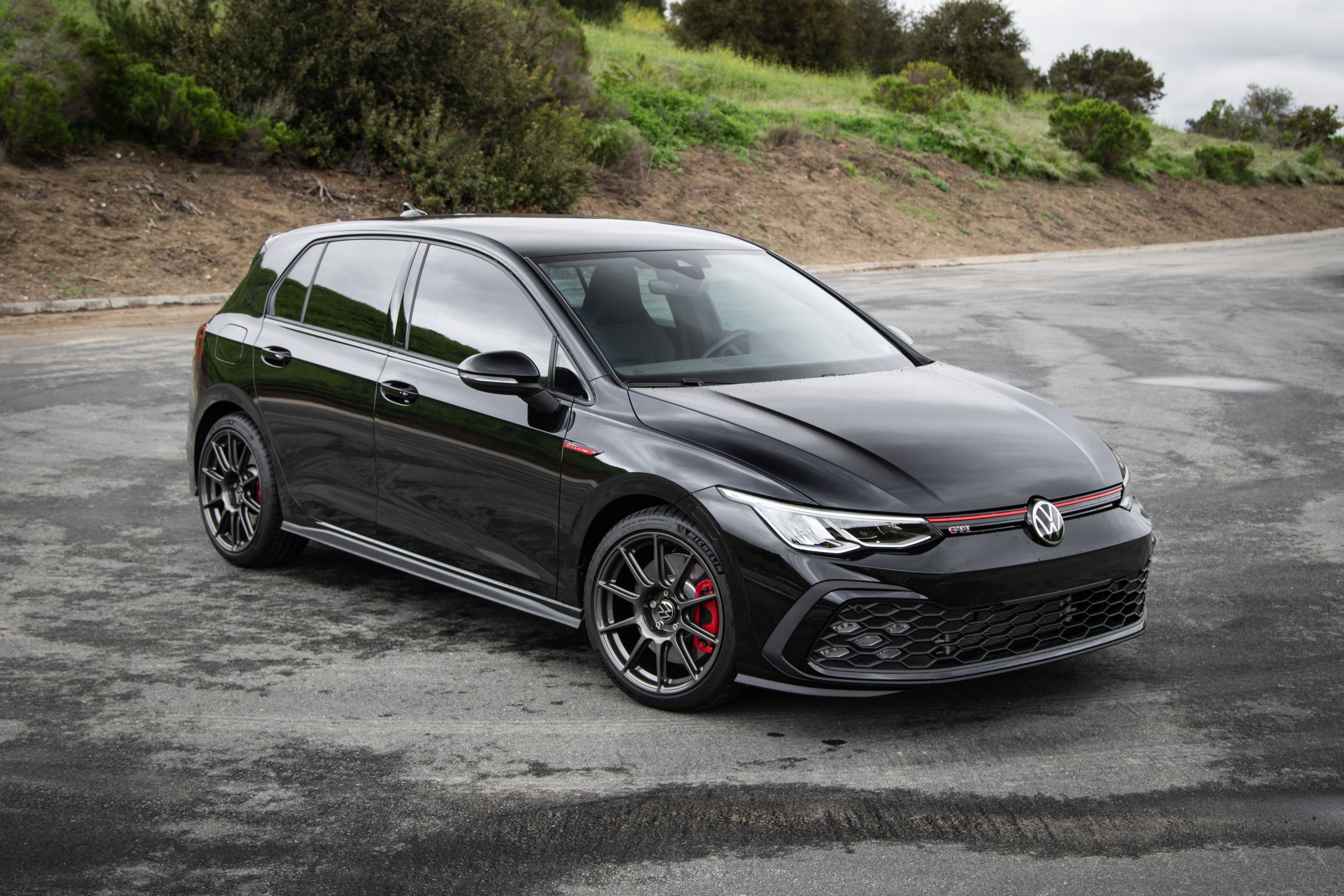 Black VW MK8 GTI with 18" SM-10 Apex wheels in Anthracite