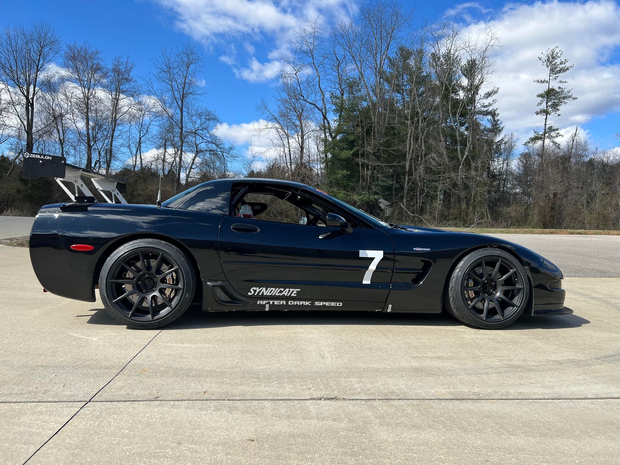 Black Chevrolet C5 Corvette Z06 with 19" SM-10 Apex wheels in Satin Black