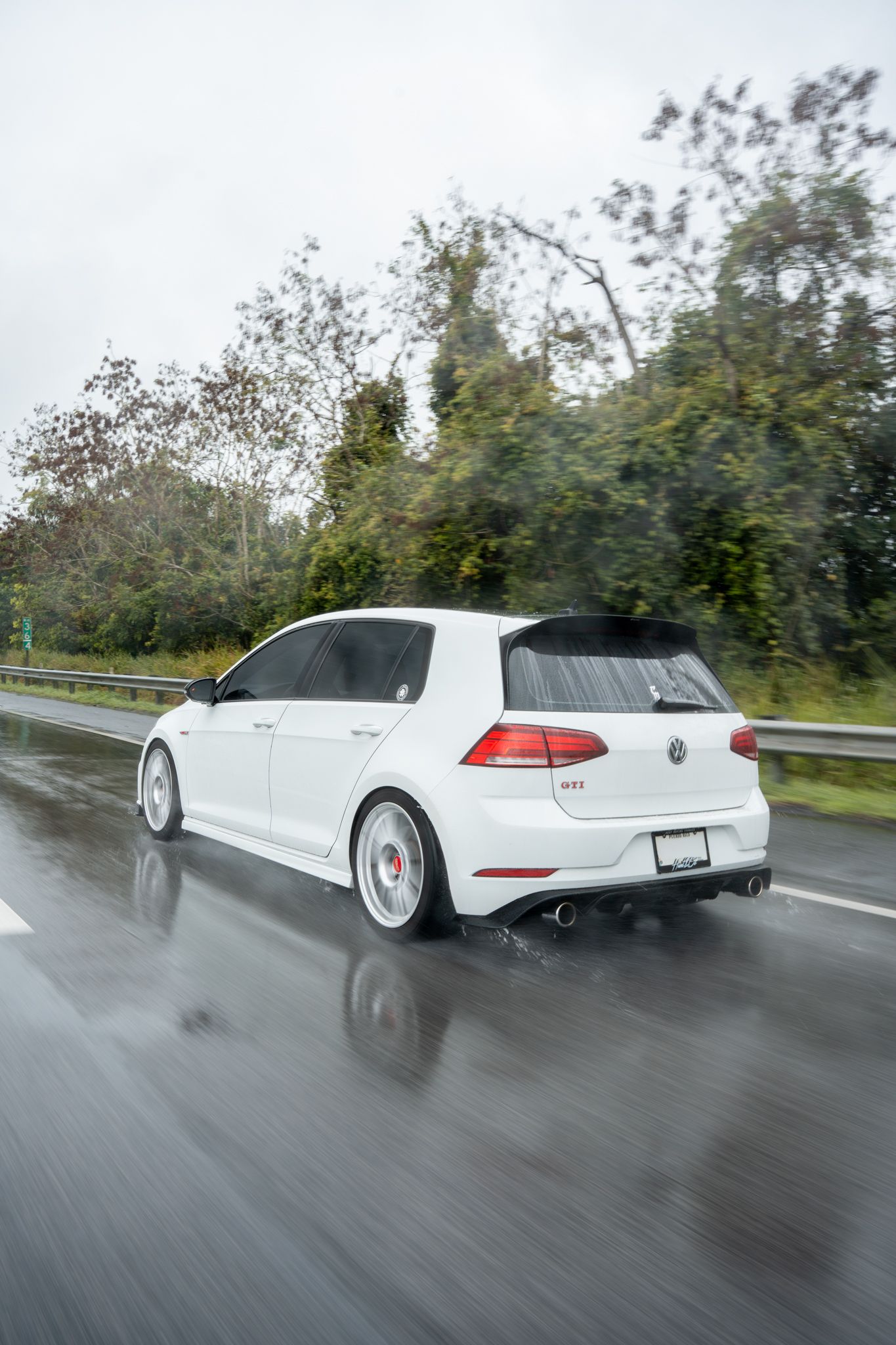 White VW MK7 GTI with 18" SM-10 Apex wheels in Race Silver