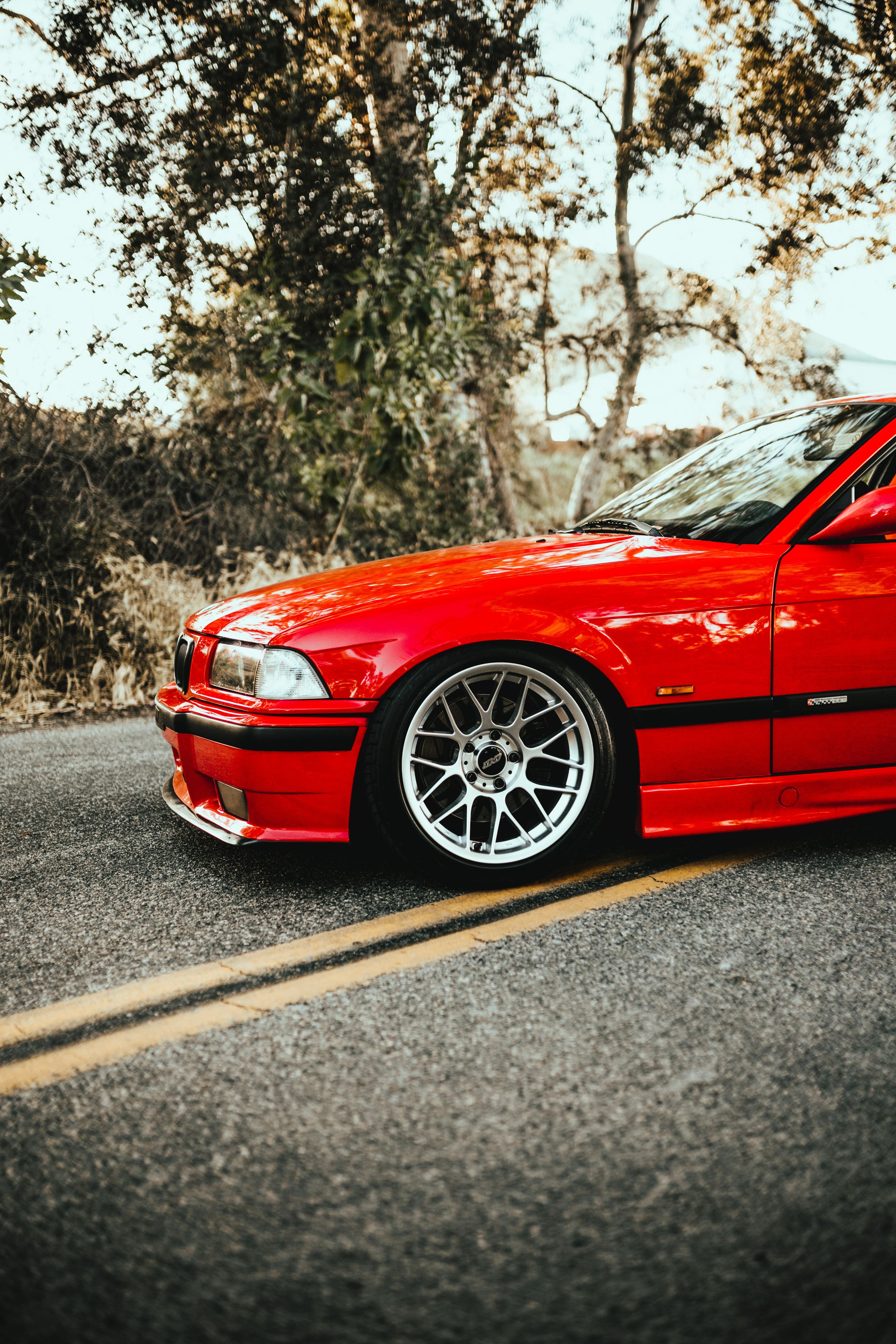 Red BMW E36 M3 with 17" ARC-8 Apex wheels in Hyper Silver