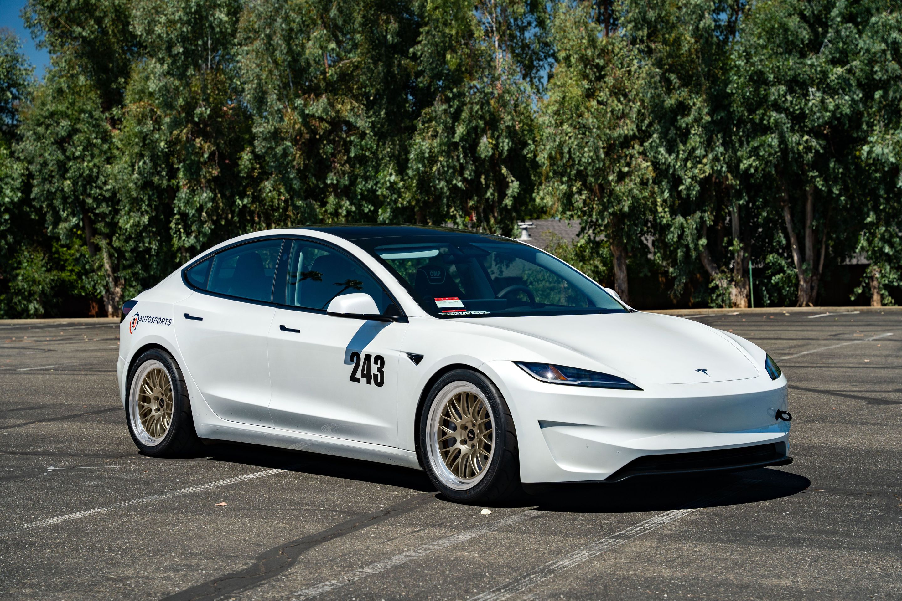 White Tesla Model 3 with 19" ML-10RT Apex wheels in Machined Lip Gloss Motorsport Gold