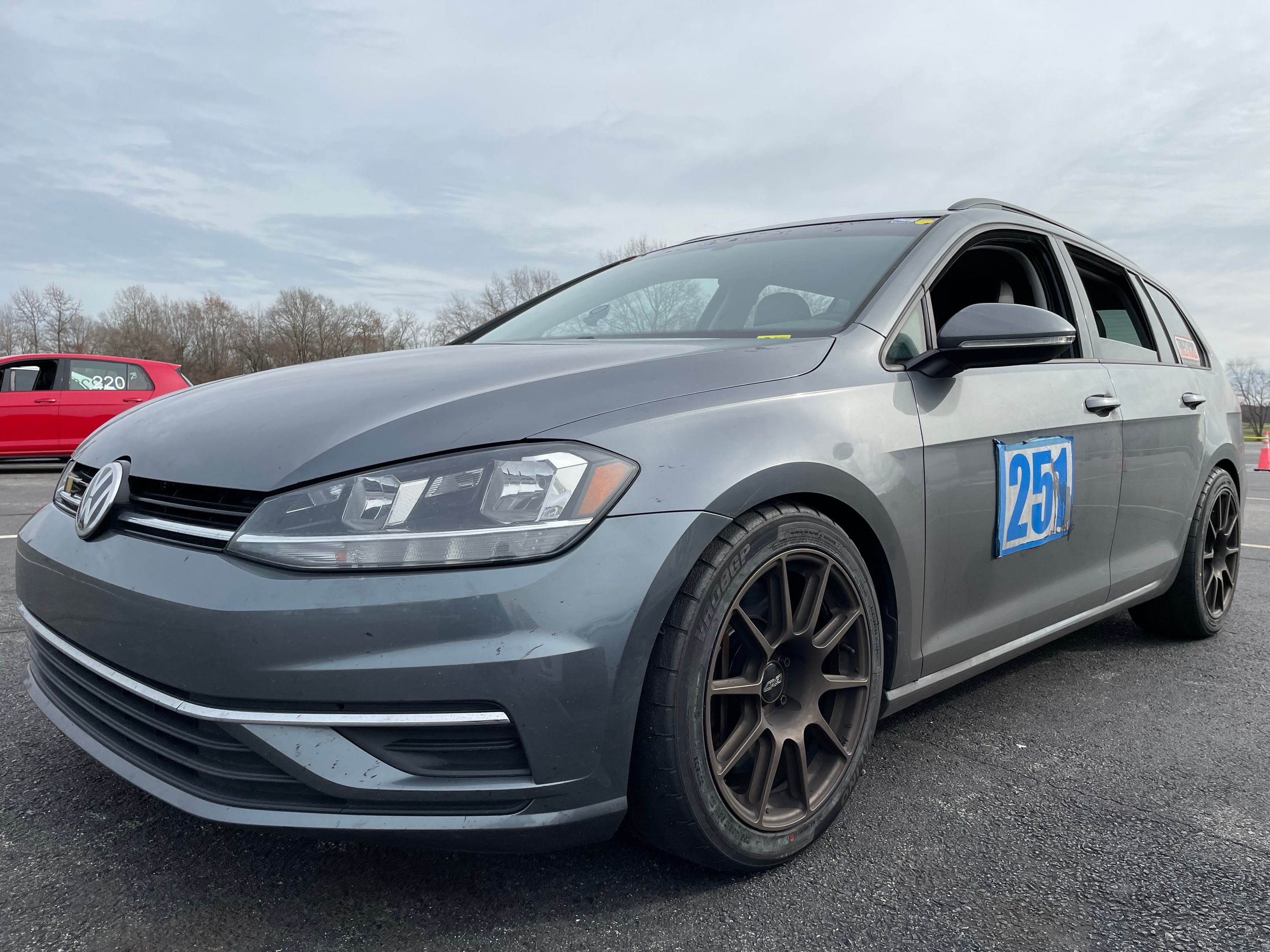 Grey VW MK7 Alltrack/SportWagen Golf SportWagen with 17" SM-10 Apex wheels in Satin Bronze