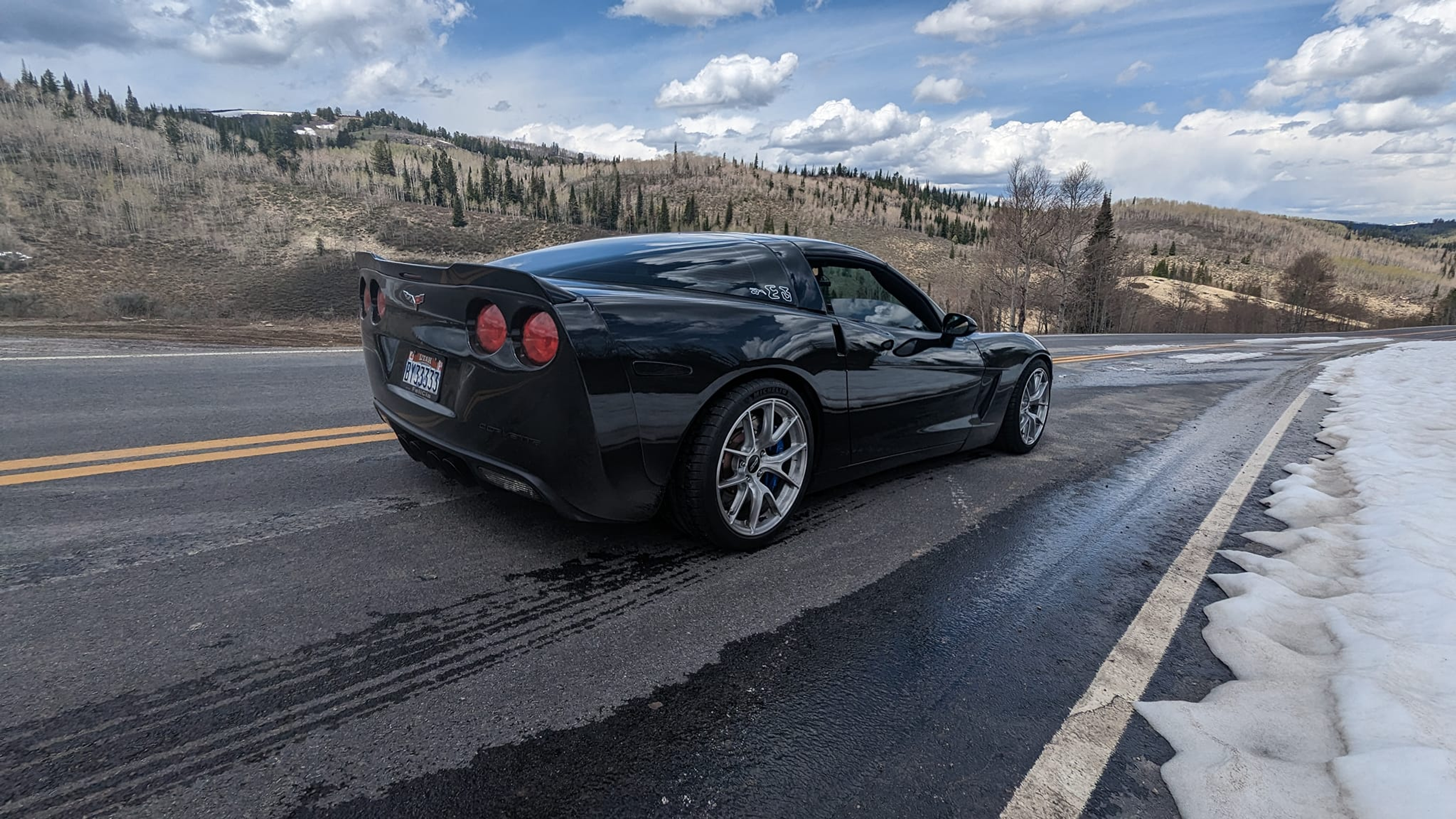 Black Chevrolet C6 Corvette Base/Z51 with 18" VS-5RS Apex wheels in Brushed Clear