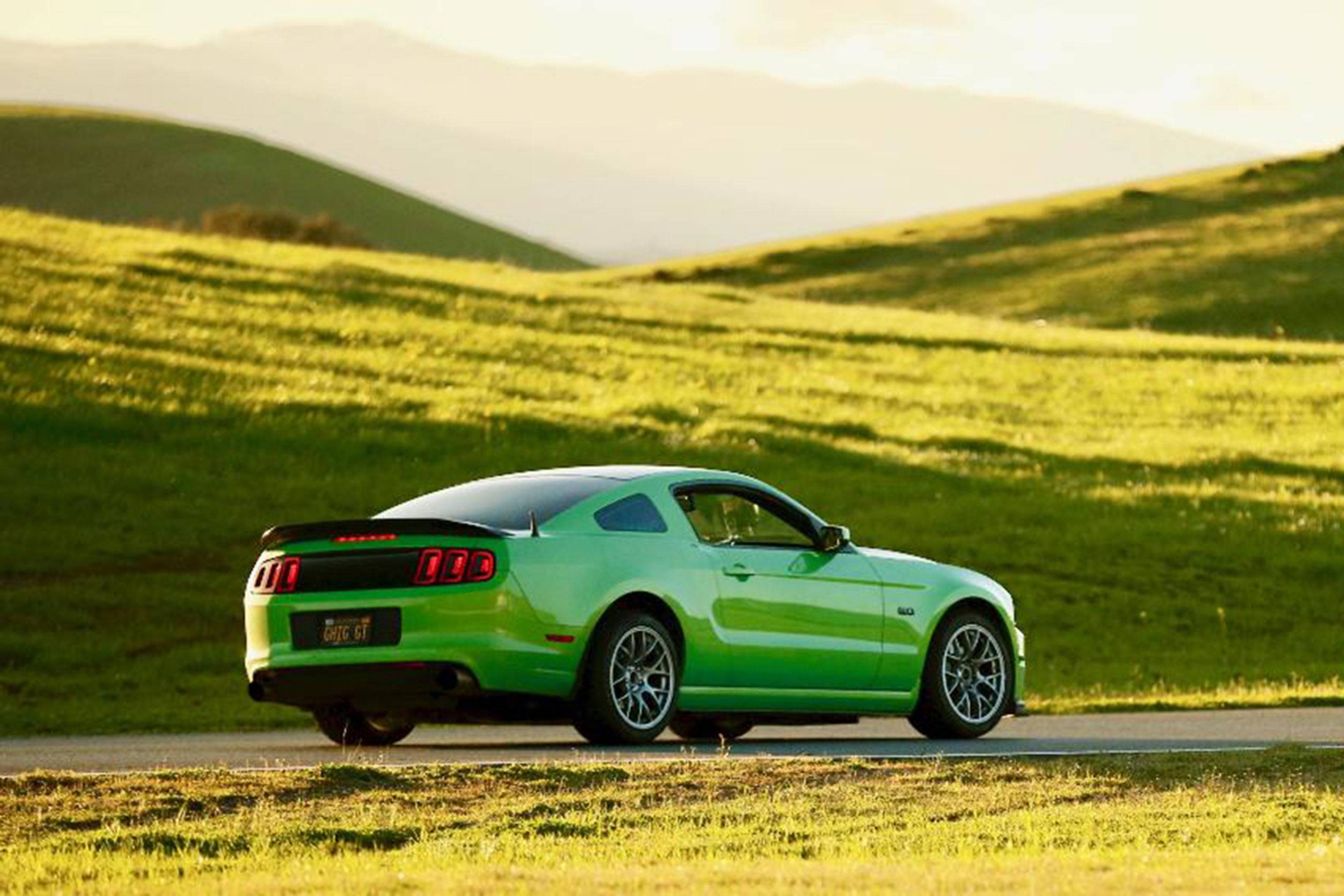 Green Ford S197 Mustang GT with 18" EC-7 Apex wheels in Race Silver
