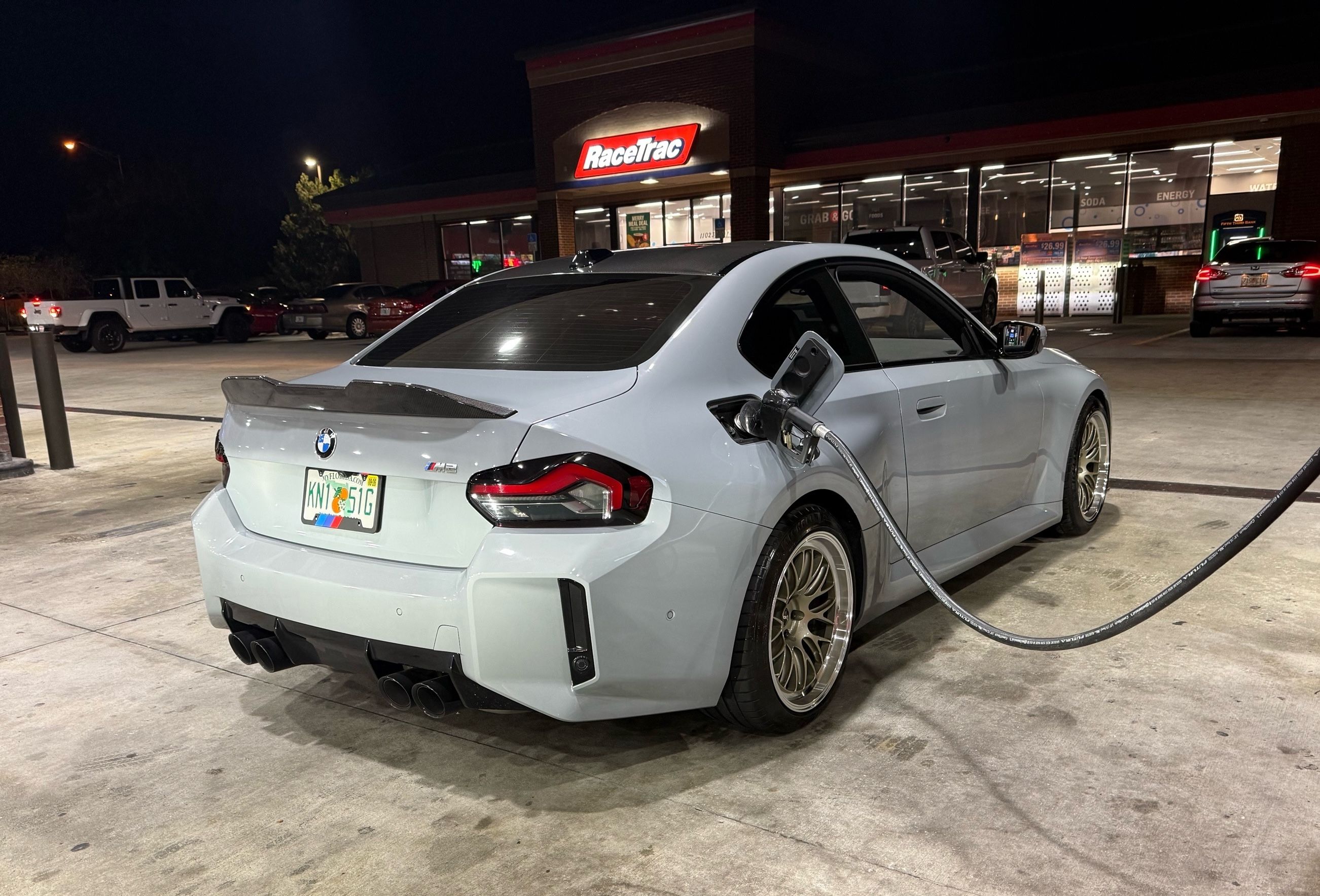 Grey BMW G87 M2 with 19" ML-10RT Apex wheels in Machined Lip Gloss Motorsport Gold