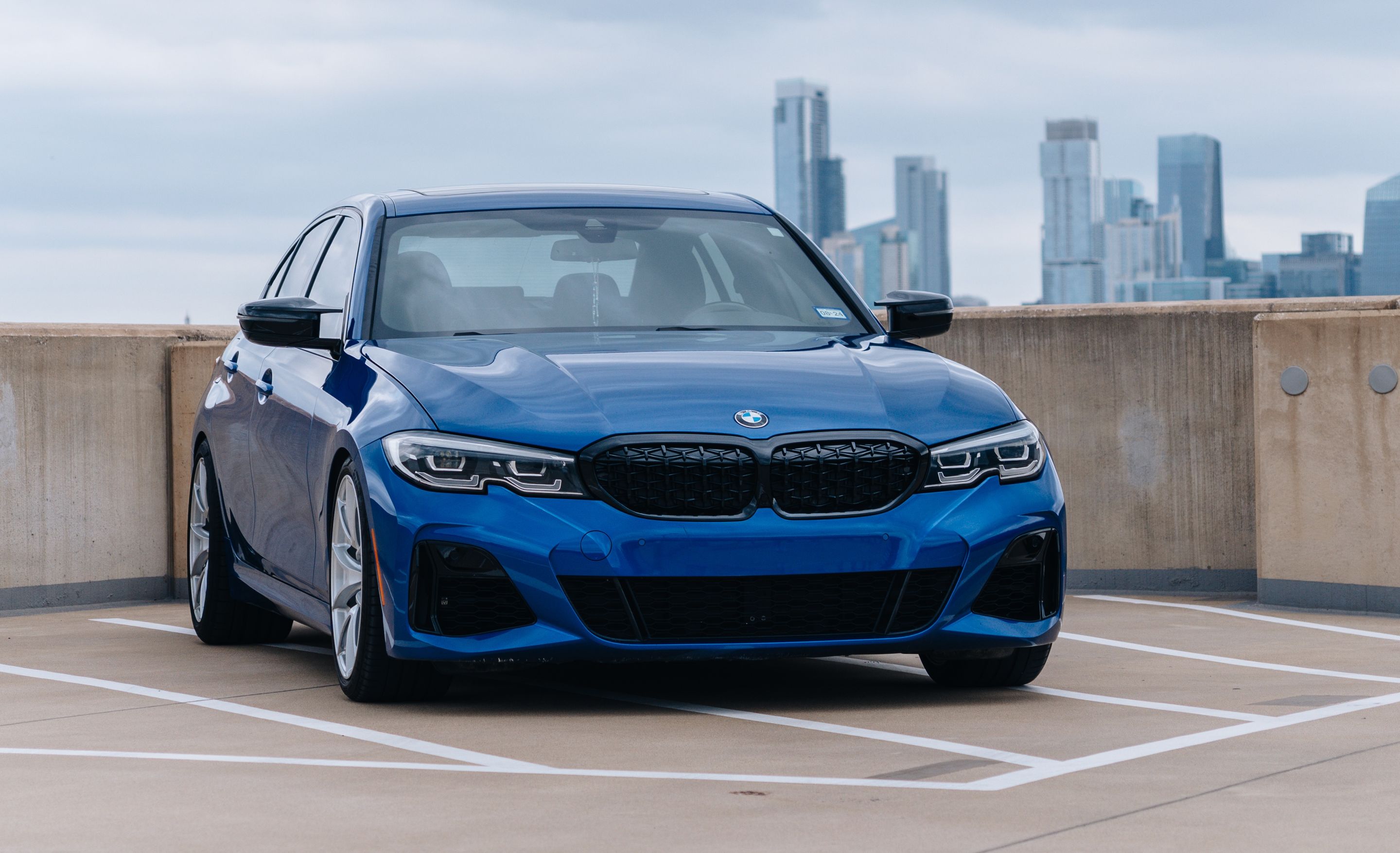 Blue BMW G20 Sedan 3 Series with 19" VS-5 Apex wheels in Race Silver