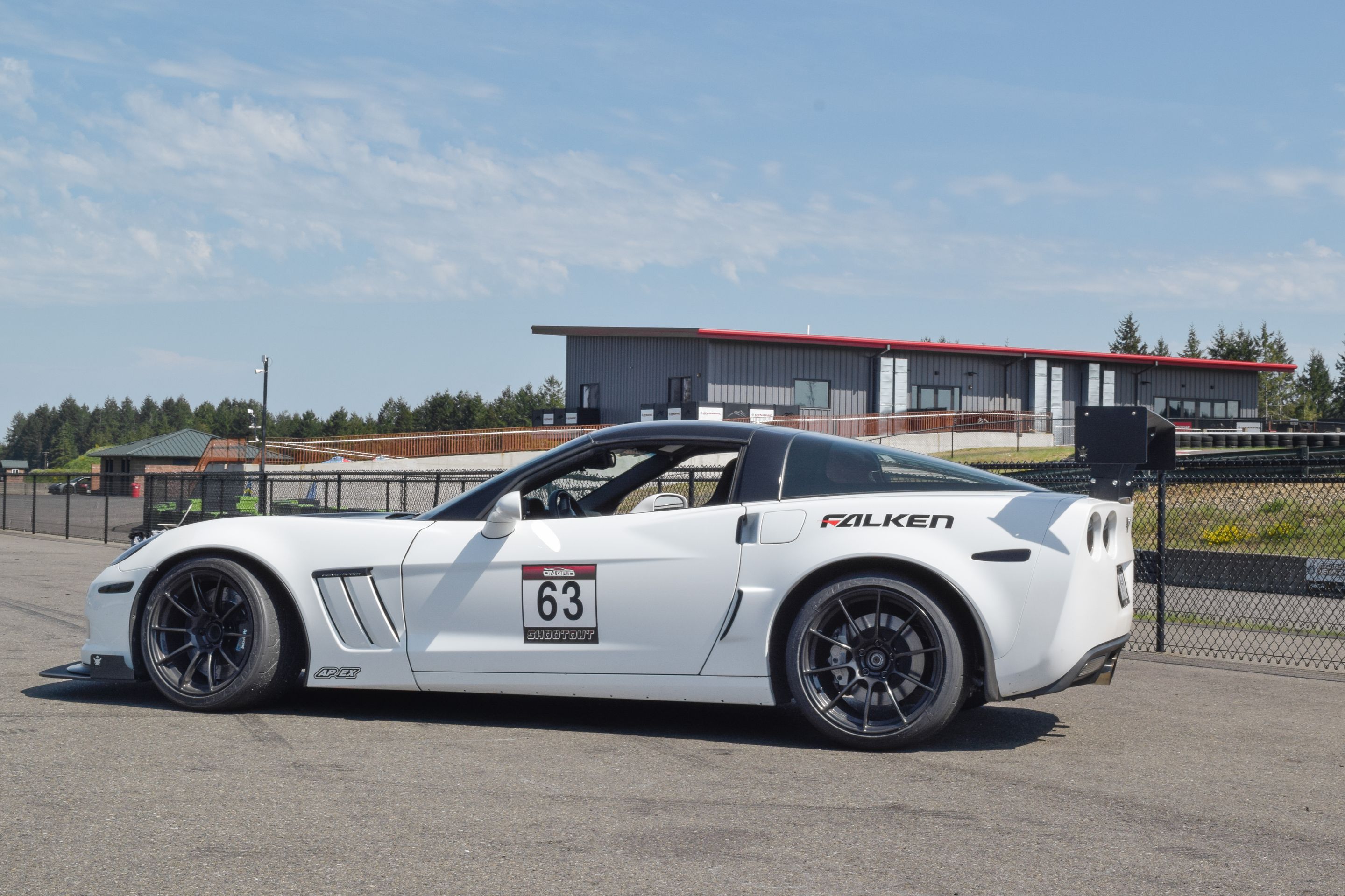 White Chevrolet C6 Corvette Grand Sport with 18"/19" SM-10RS Apex wheels in Satin Black