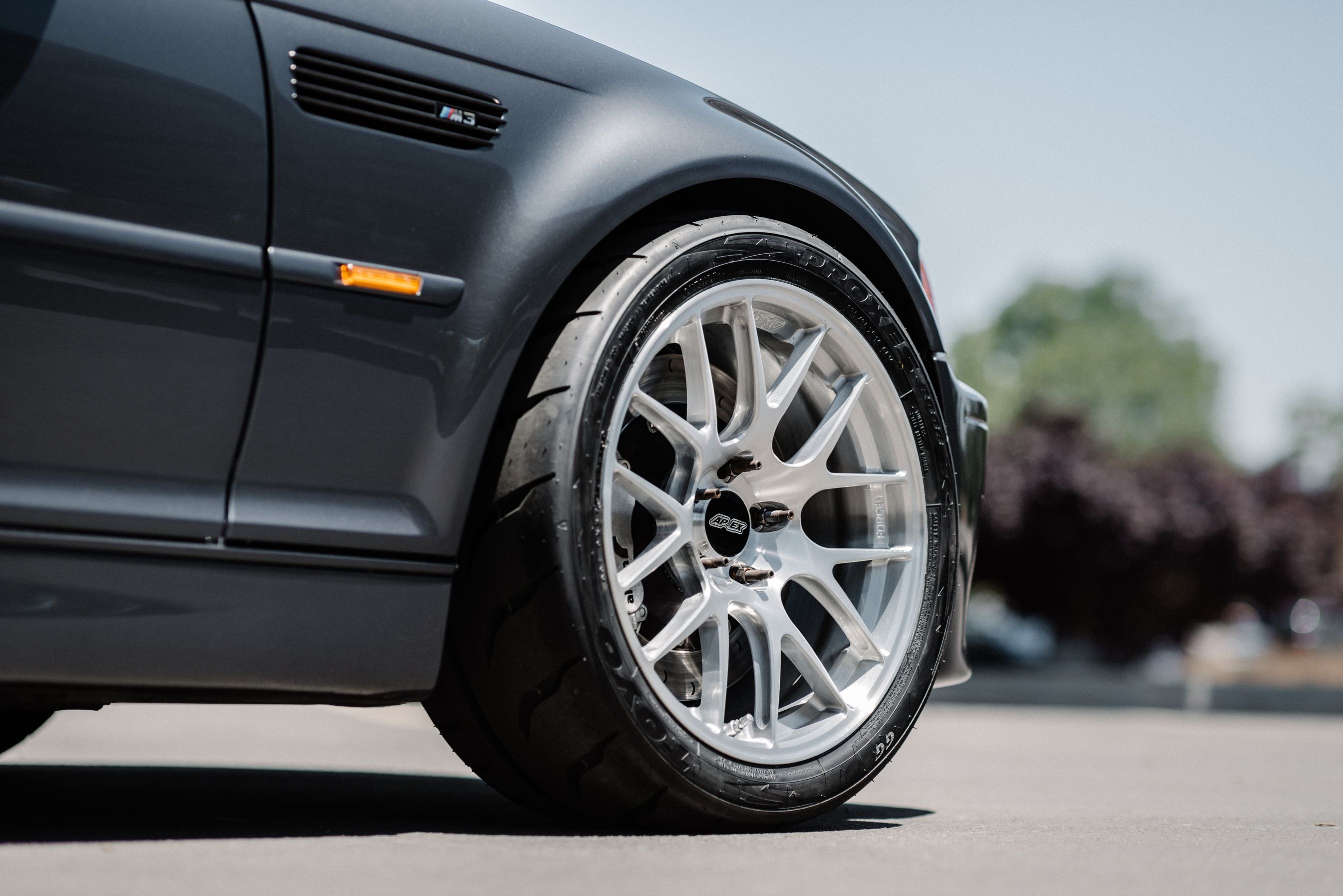 Grey BMW E46 M3 with 18" EC-7R Apex wheels in Brushed Clear