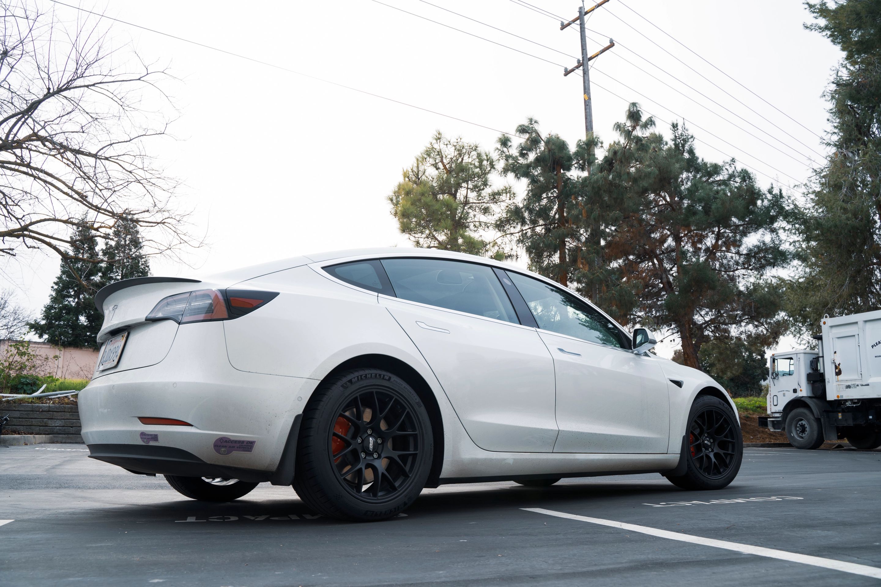 White Tesla Model 3 with 18" EC-7 Apex wheels in Satin Black