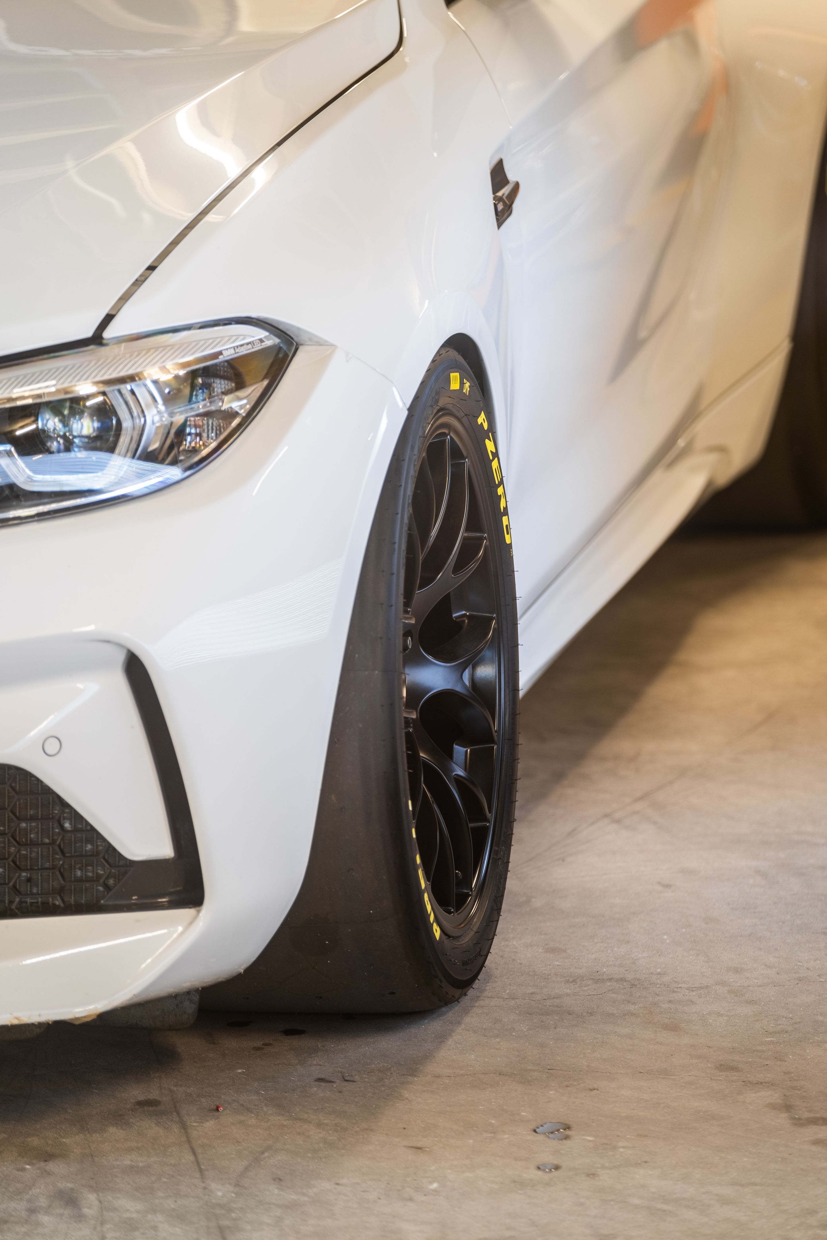 White BMW F87 M2 with 18" EC-7 Apex wheels in Satin Black
