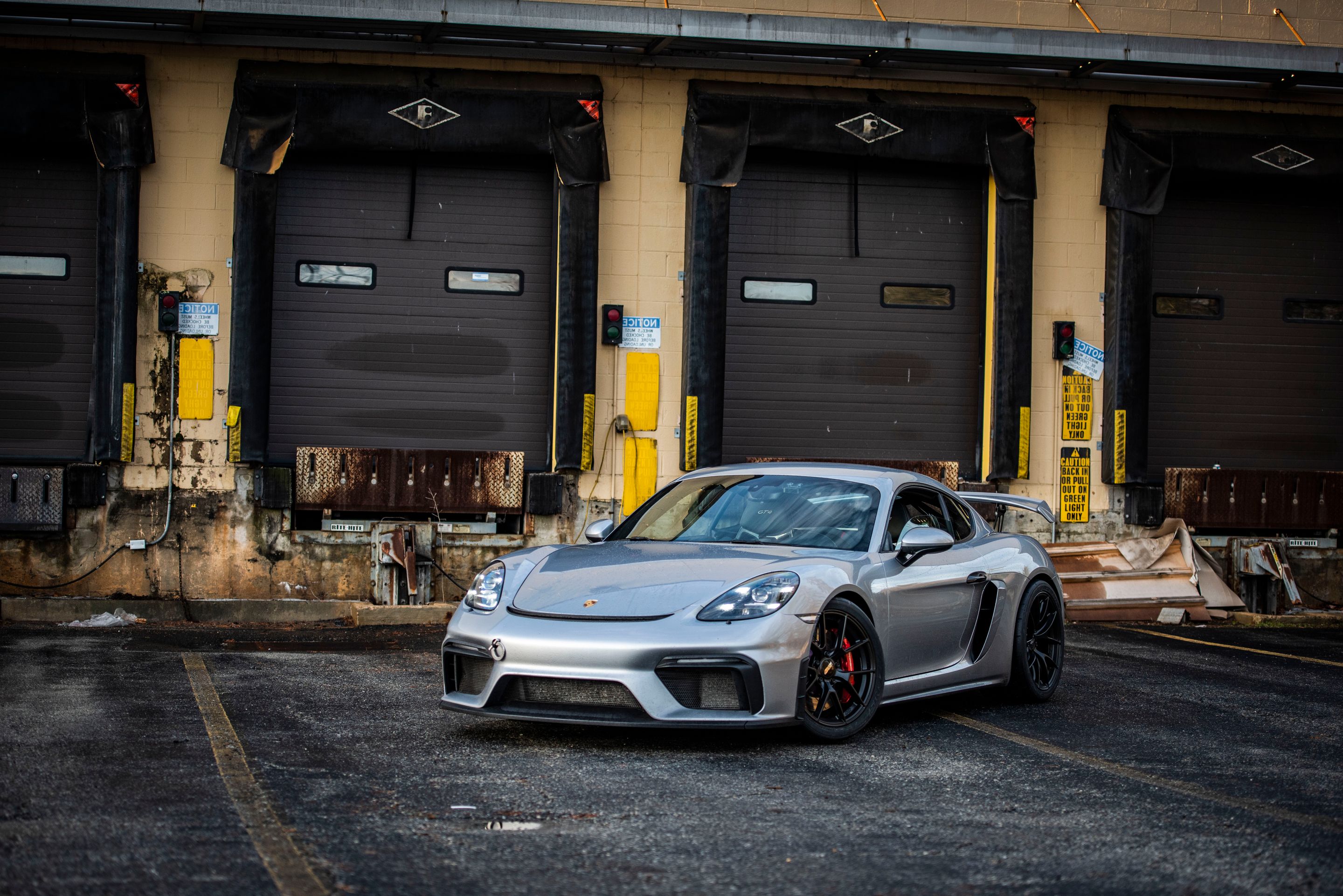 Silver Porsche 718 Cayman GT4 with 19" VS-5RS Apex wheels in Satin Black
