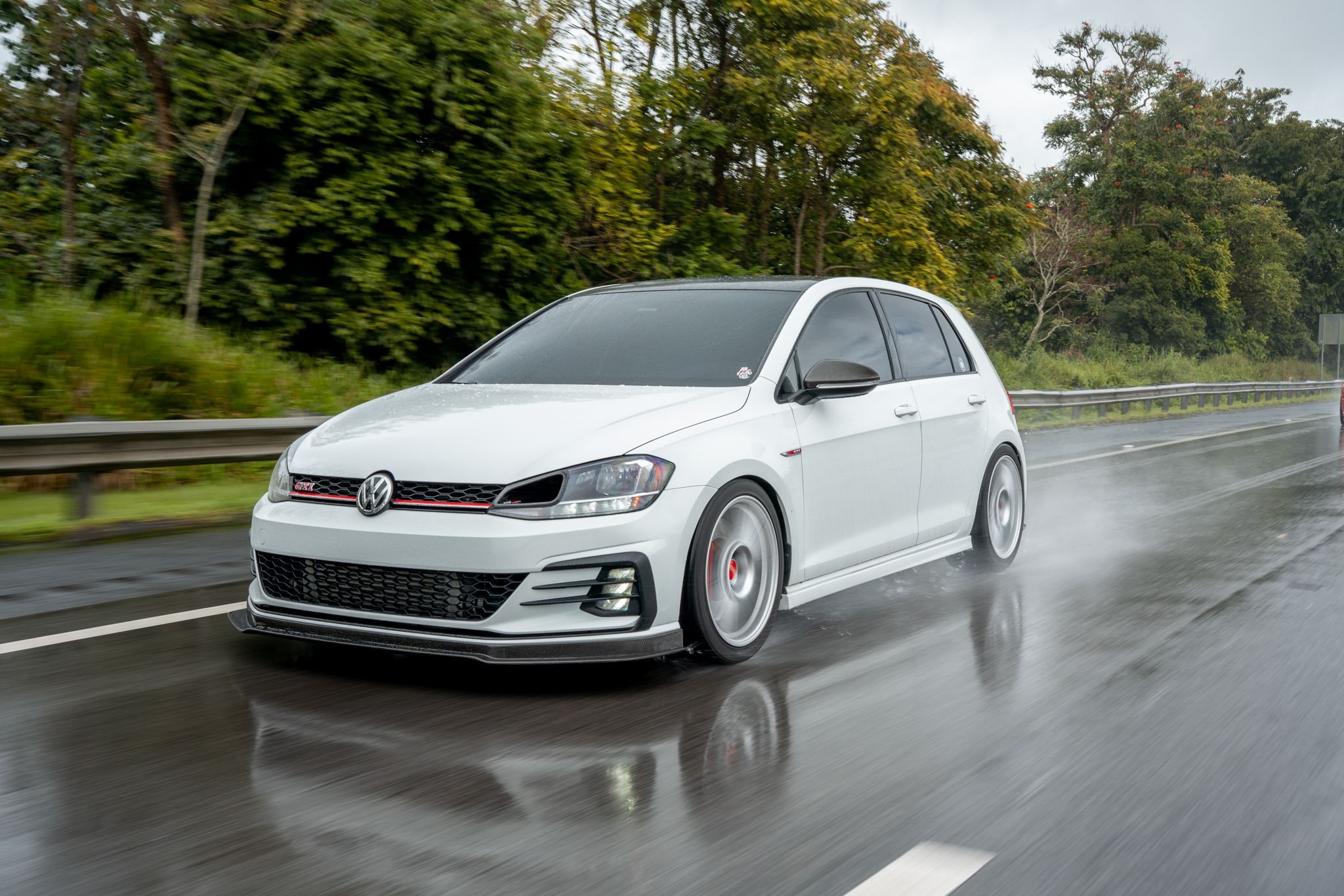 White VW MK7 GTI with 18" SM-10 Apex wheels in Race Silver