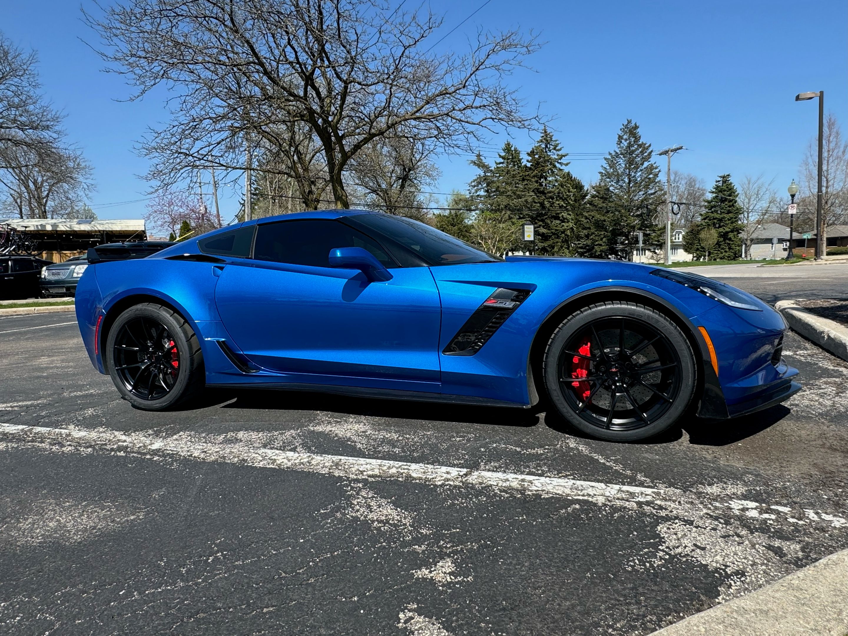 Blue Chevrolet C7 Corvette Z06 with 19" VS-5RS Apex wheels in Satin Black