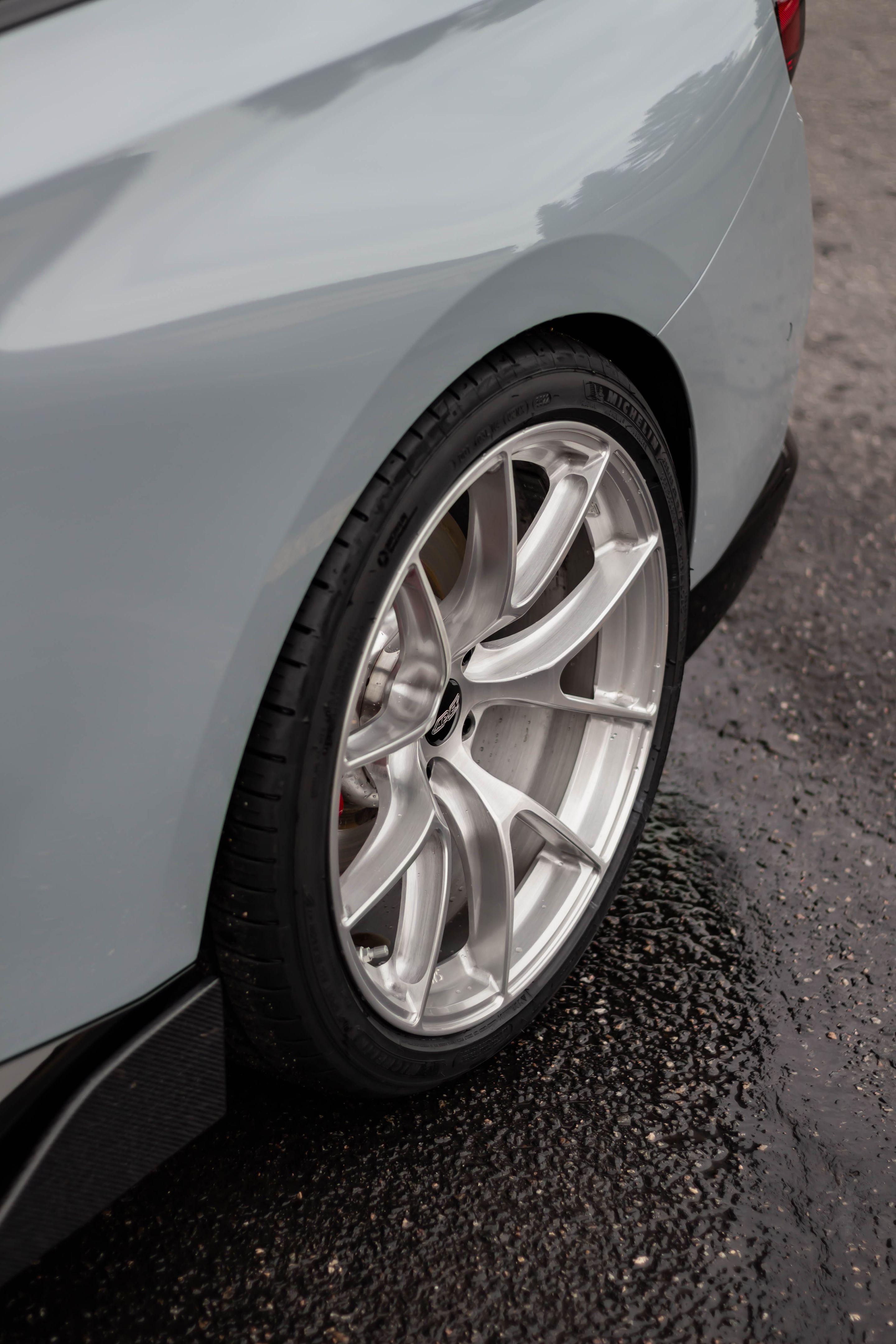 Grey BMW G42 2 Series with 19" VS-5RS Apex wheels in Brushed Clear