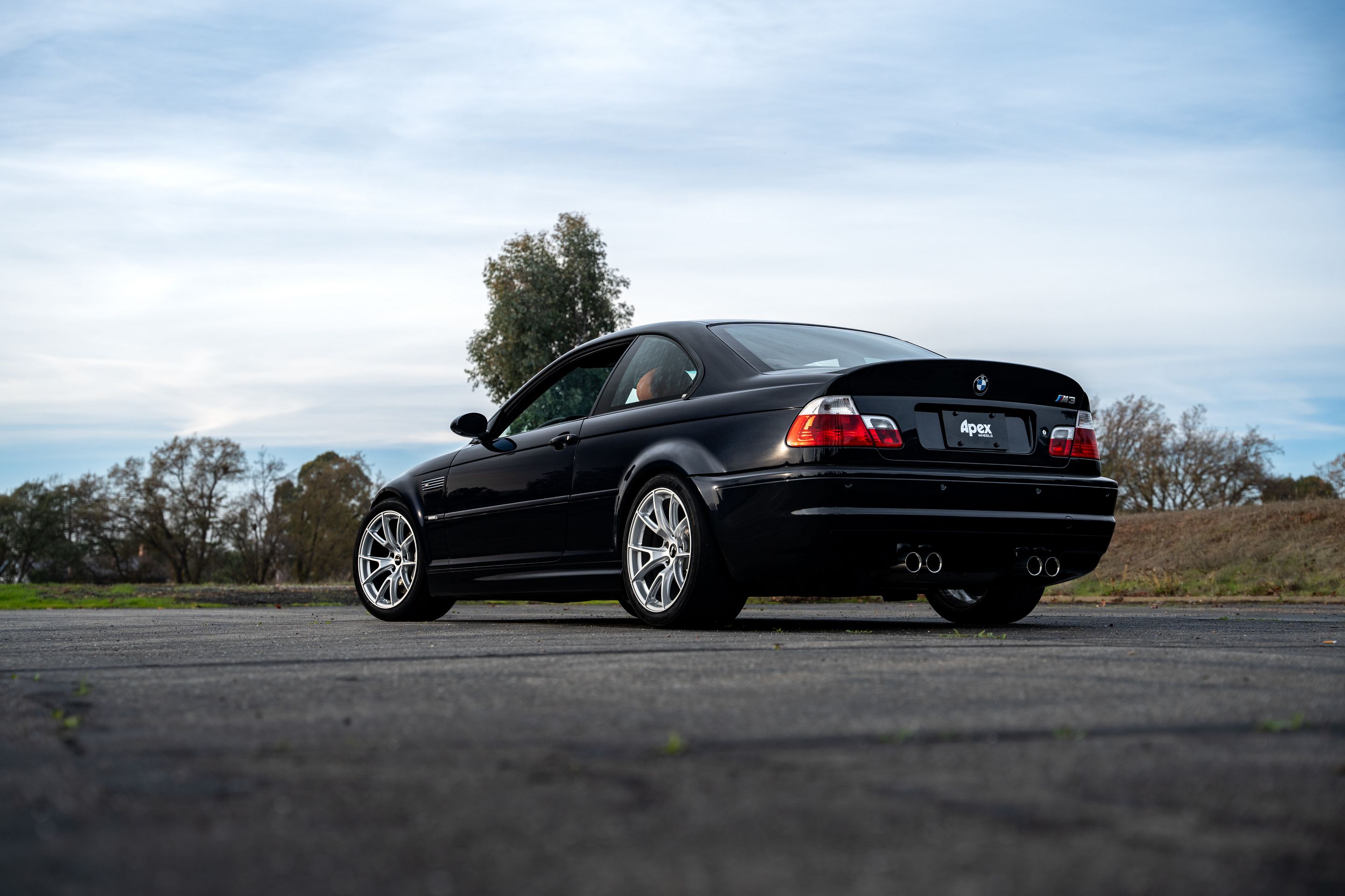 Black BMW E46 M3 with 18" VS-5 Apex wheels in Race Silver